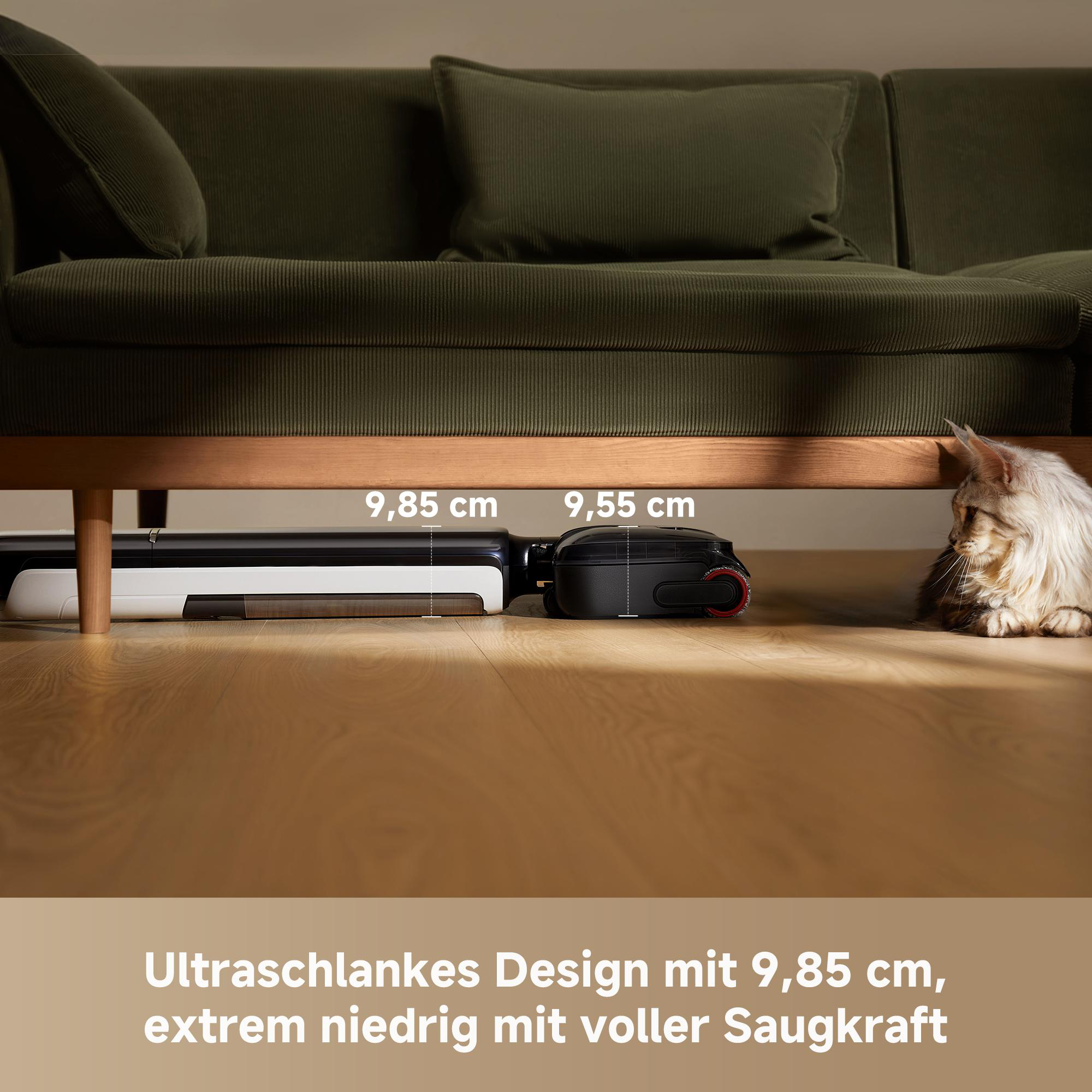 Ein Staubsauger unter einem Sofa, mit Maßen 9,85 cm und 9,55 cm.