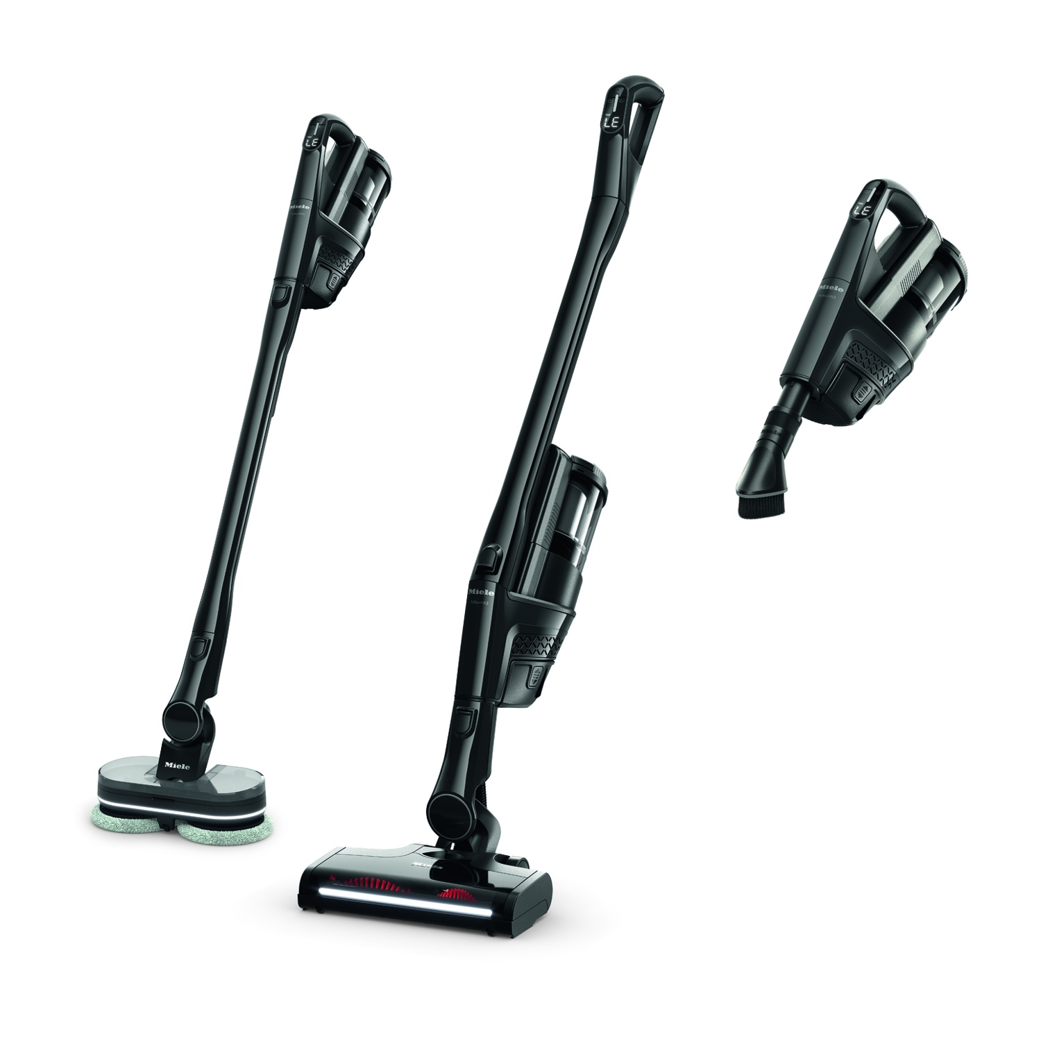 Tre aspirapolvere Miele neri: due verticali, uno portatile, su sfondo bianco.