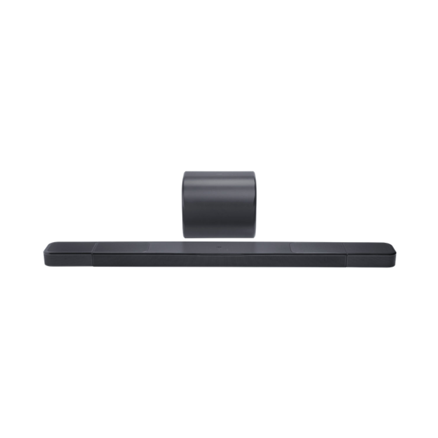 Una barra de sonido negra y un subwoofer cilíndrico se muestran sobre fondo blanco.