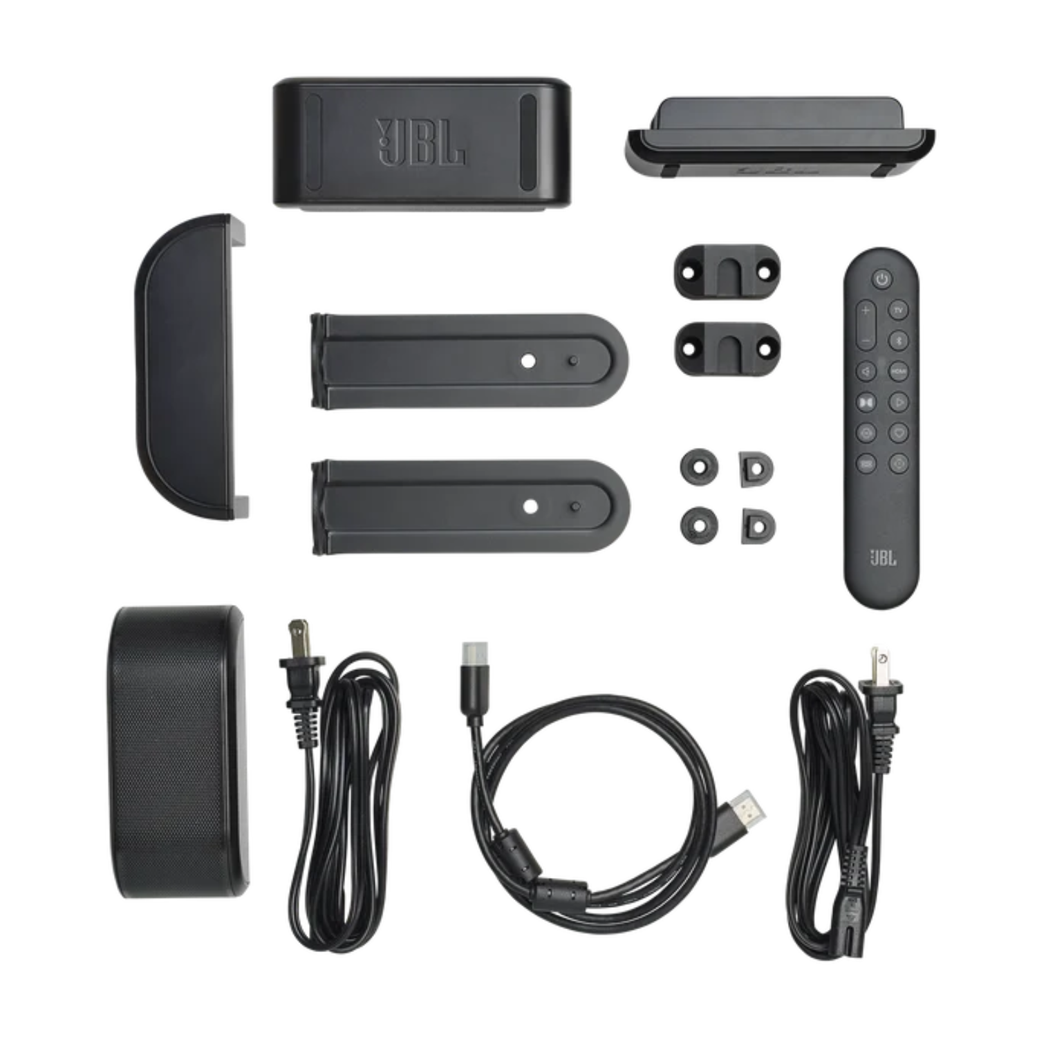 Kit de barra de sonido JBL negra con control remoto, cables y soportes.