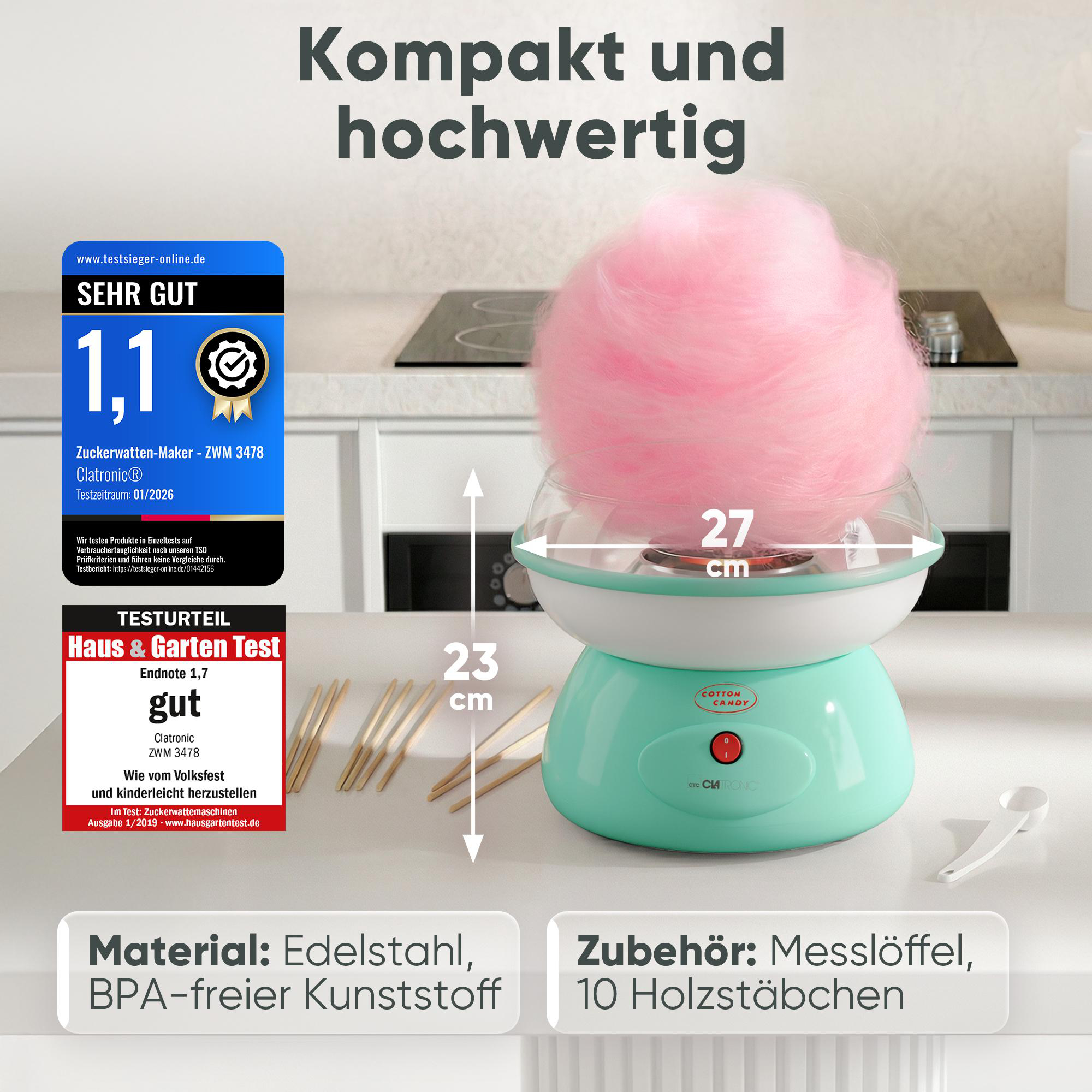 Ein mintgrüner Zuckerwattemaker mit rosa Zuckerwatte, misst 27x23cm.