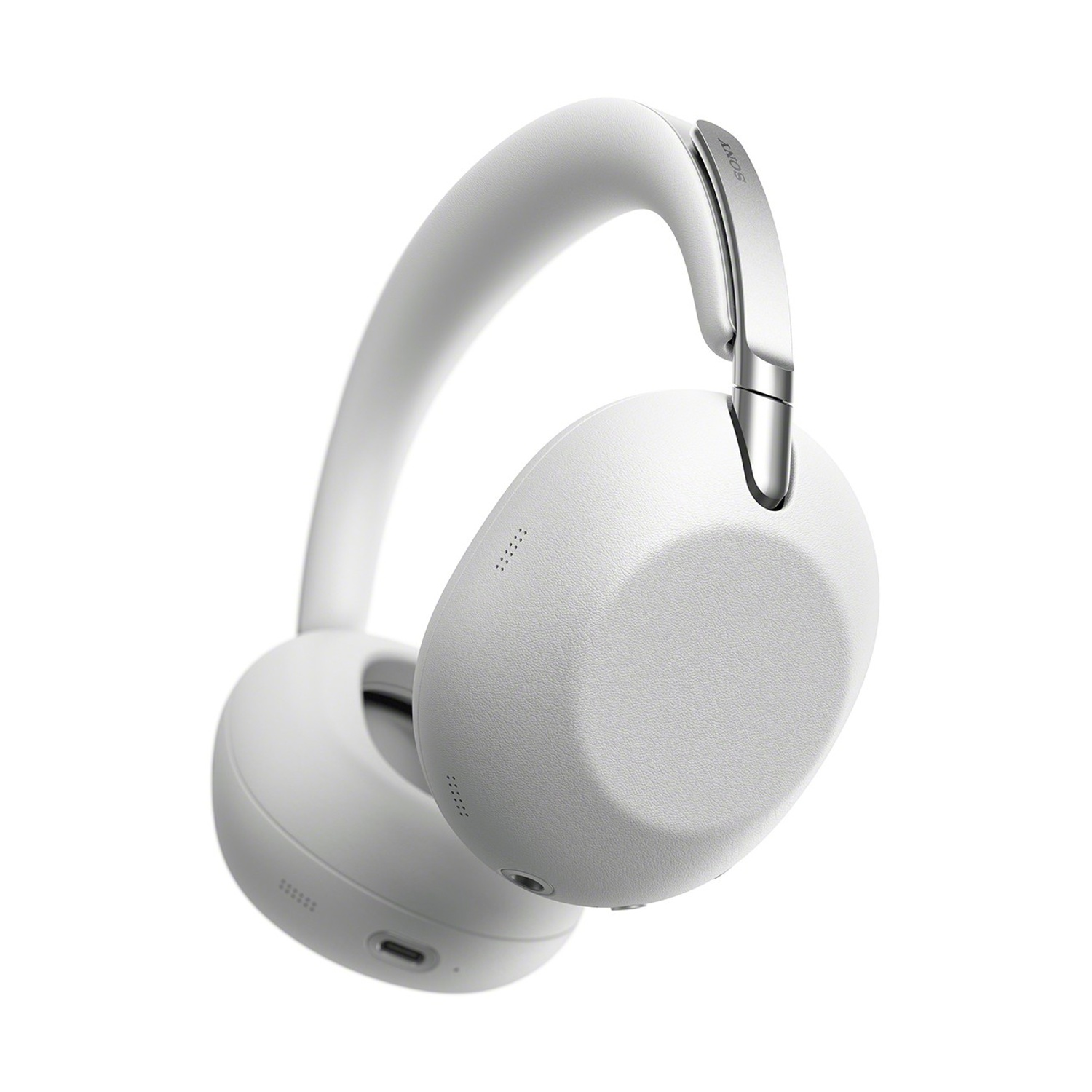 Cuffie bianche circumaurali con accenti argentati su sfondo bianco.