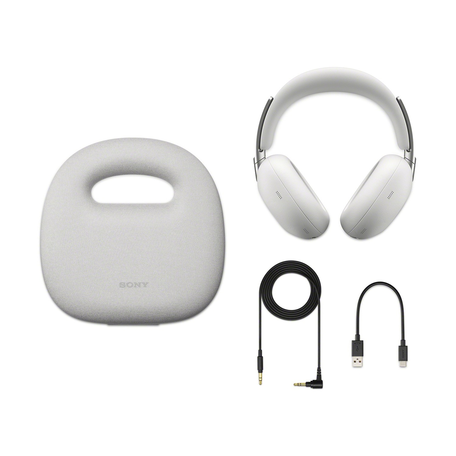 Cuffie bianche con accessori: custodia, cavo audio, cavo USB-C.