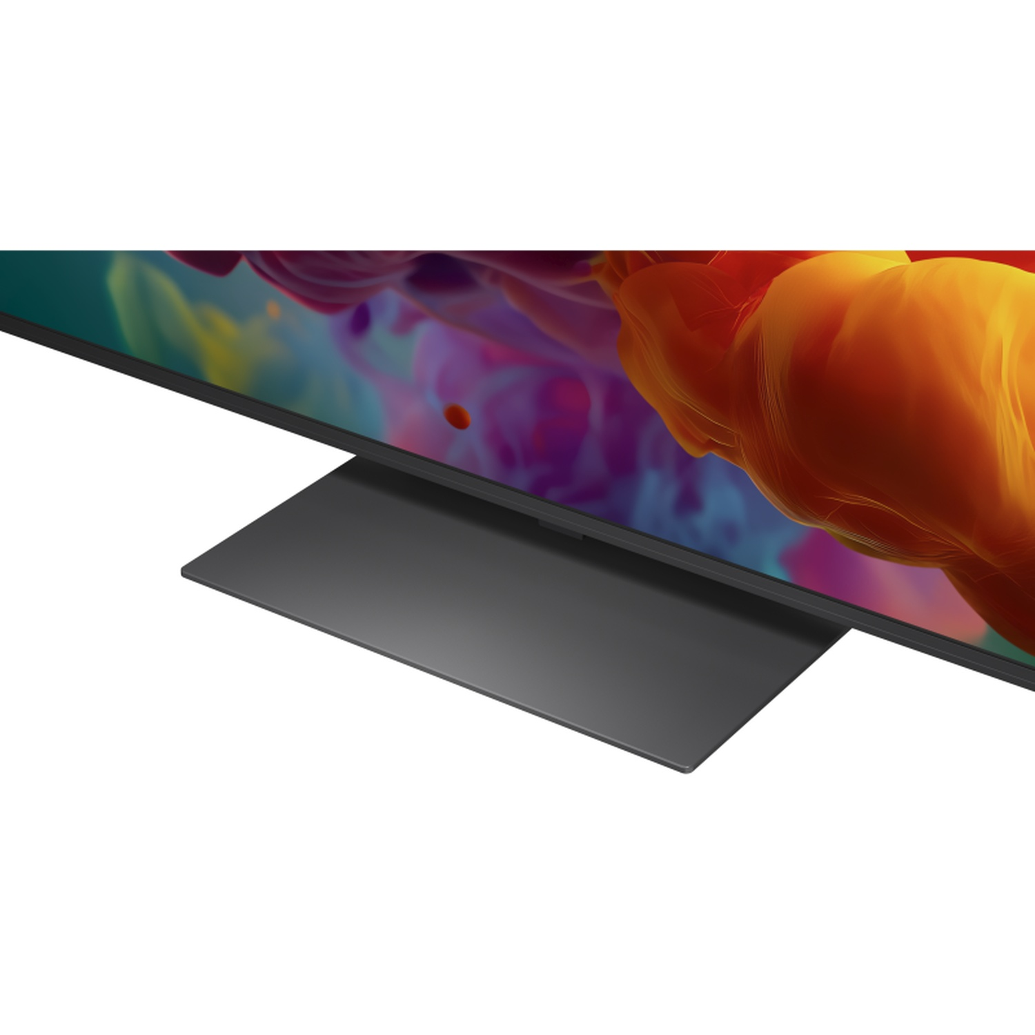 Close-up of a modern TV with a sleek stand and colorful screen content.