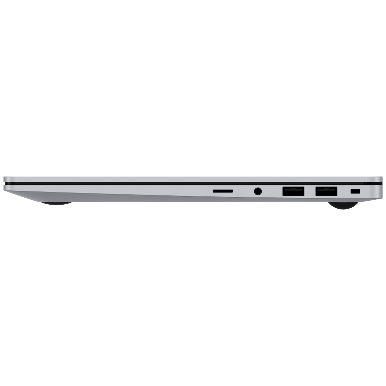 De zijkant van een grijze laptop met poorten en rubberen voetjes.