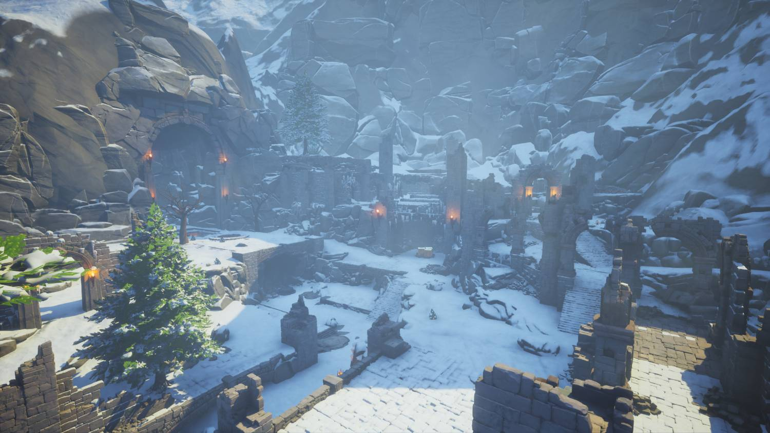Ruinas nevadas en un paisaje montañoso con arcos y árboles.