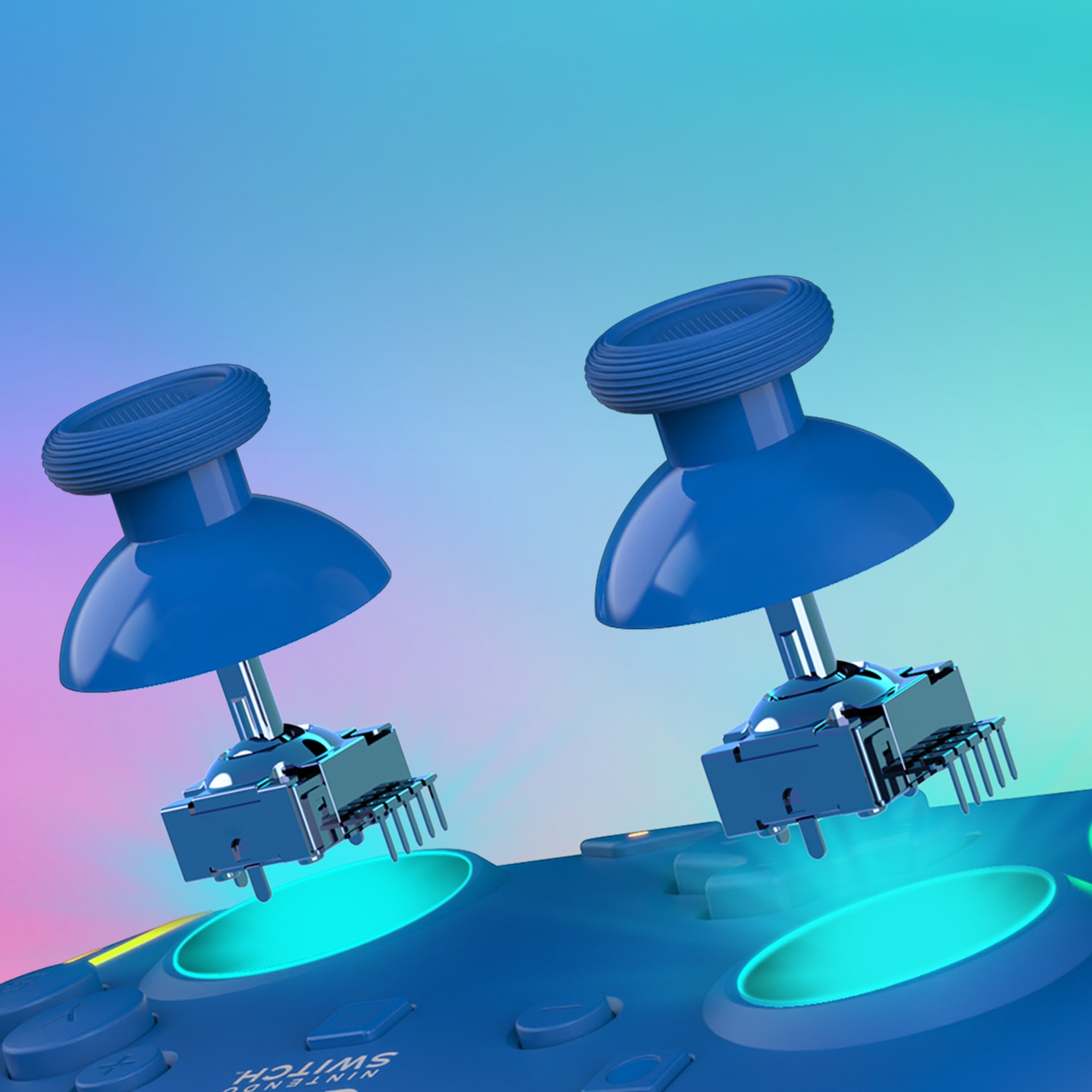 Deux modules de joystick bleus Nintendo Switch avec composants métalliques sur une manette bleue.