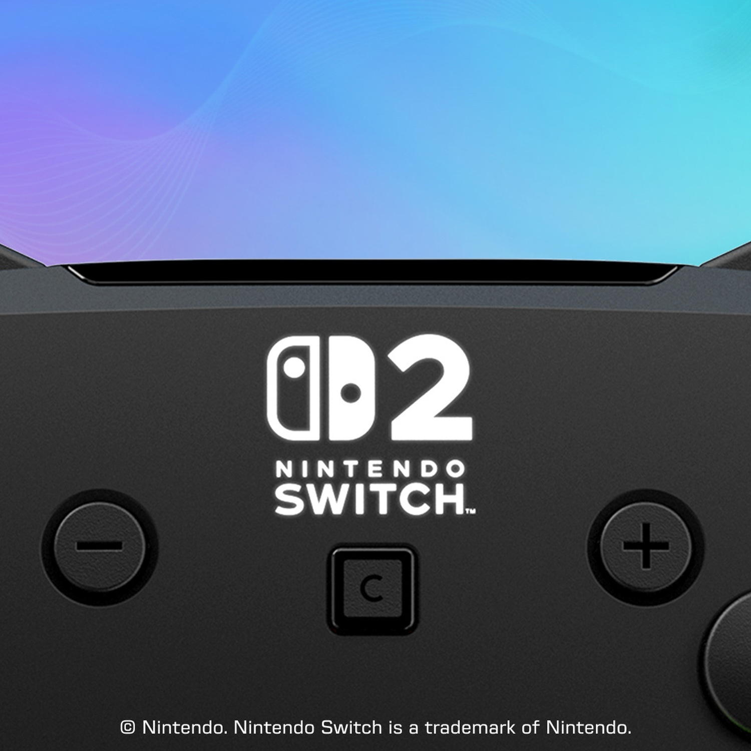 Gros plan d'une manette Nintendo Switch noire avec le logo.
