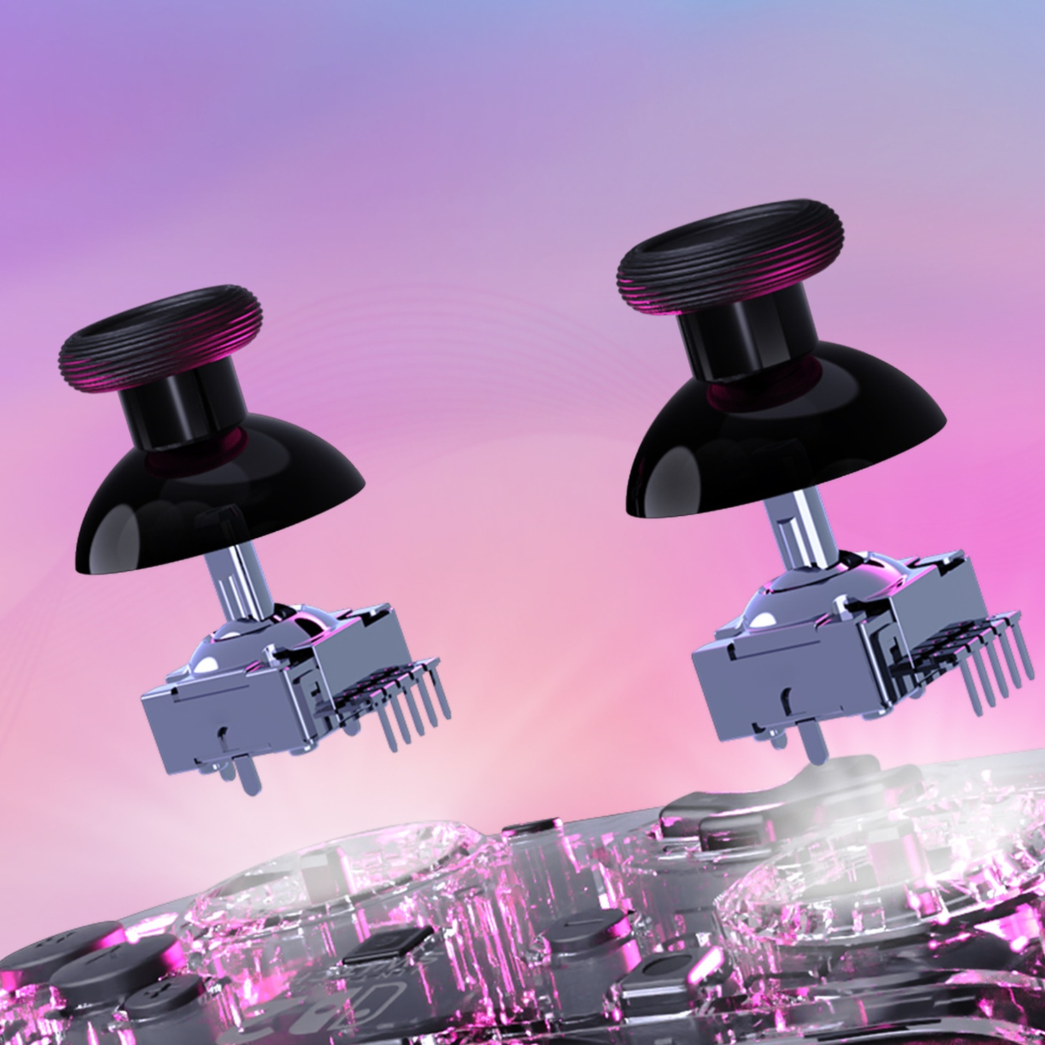 Deux joysticks noirs au-dessus d'une carte de circuit imprimé transparente avec éclairage rose.