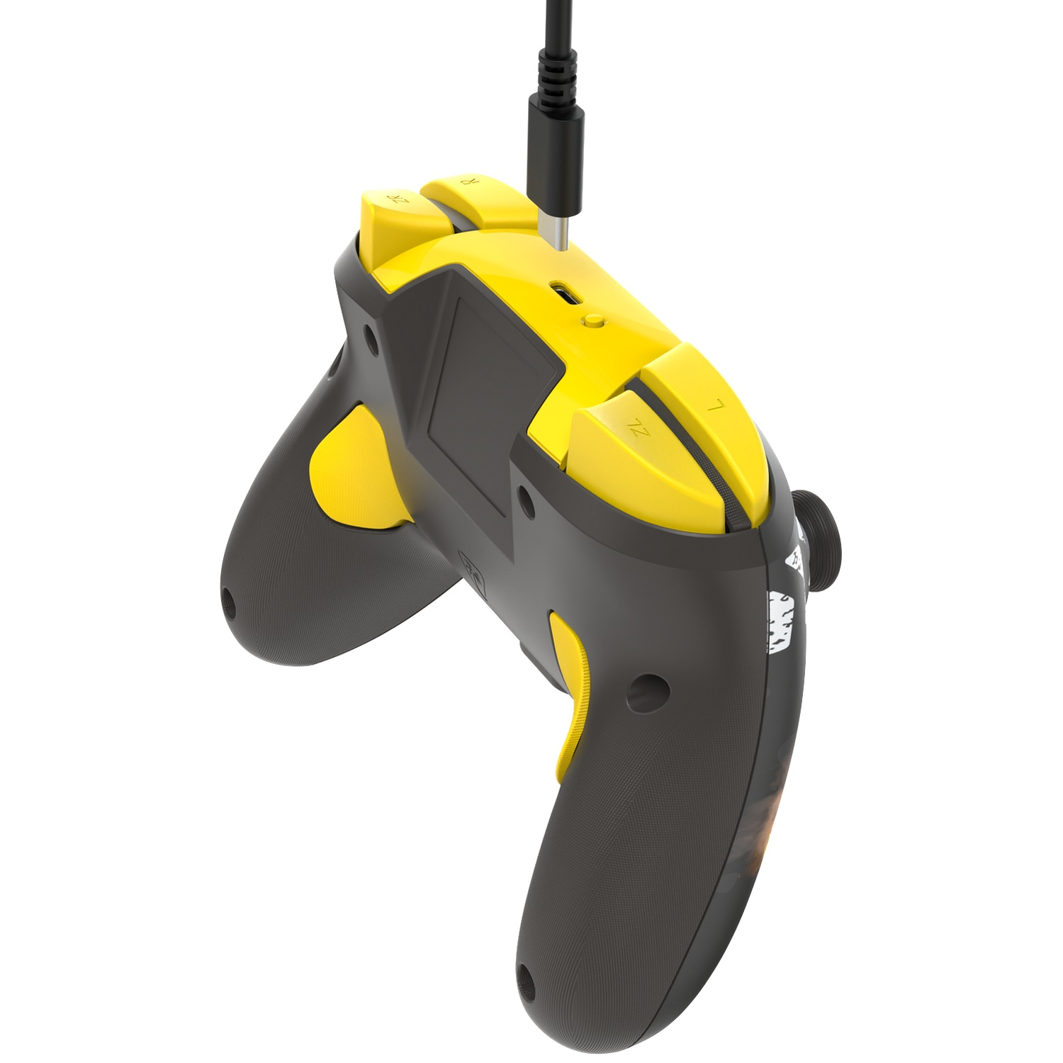 Une manette de jeu noire et jaune avec un câble attaché.
