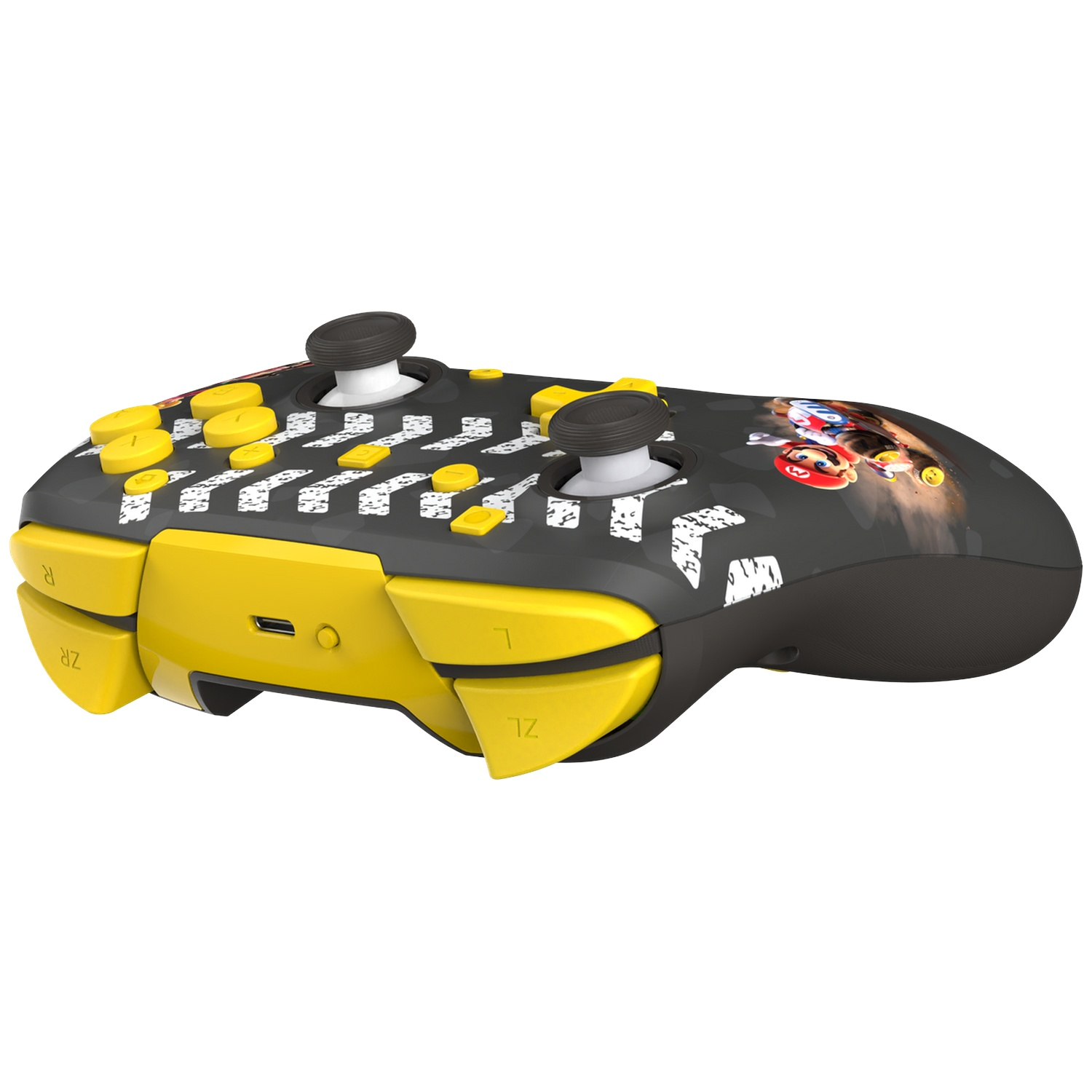 Manette noire avec accents jaunes, graphique Mario et bandes de danger.