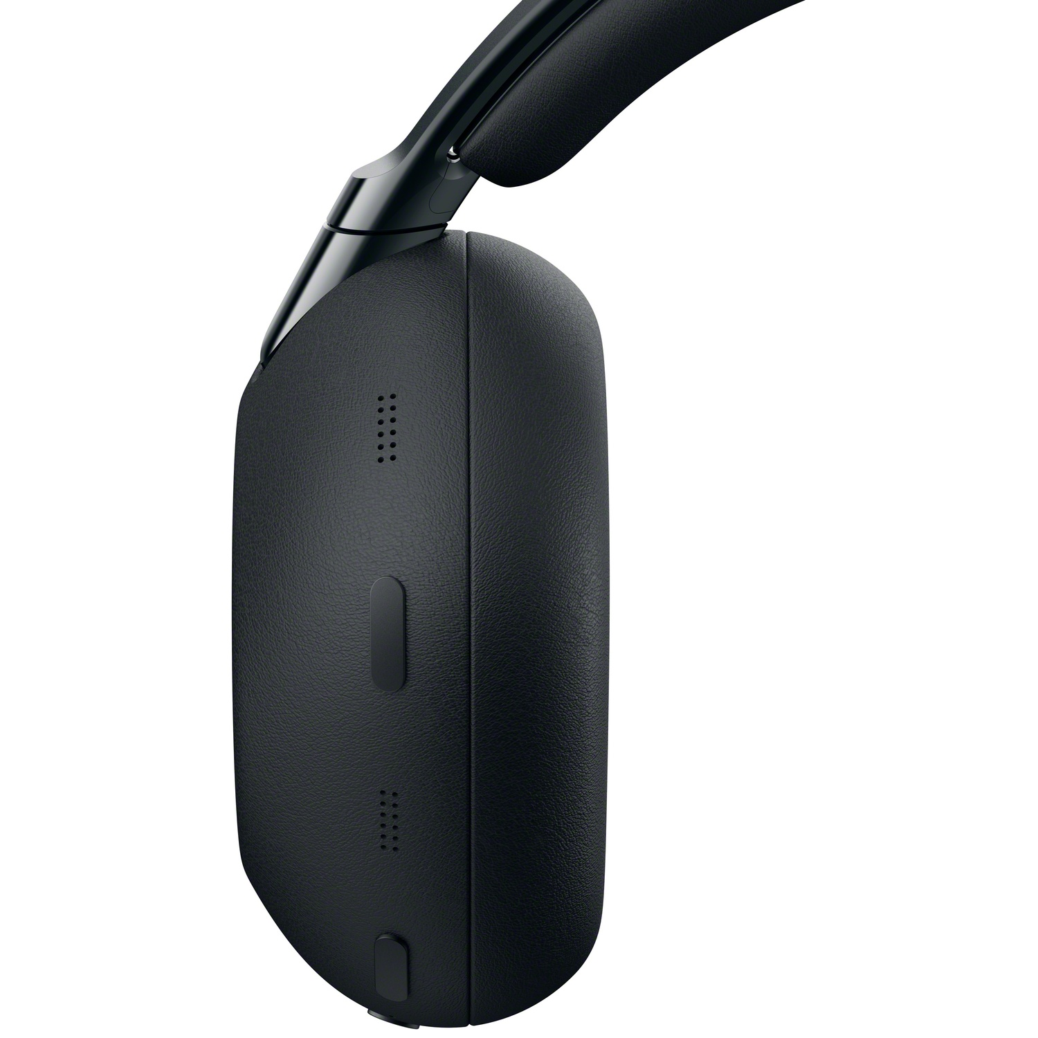 Casque noir avec écouteur et arceau, gros plan, fond blanc.