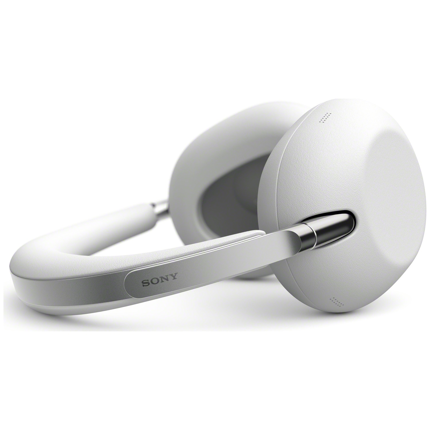 Casque Sony blanc avec accents argentés sur fond blanc.