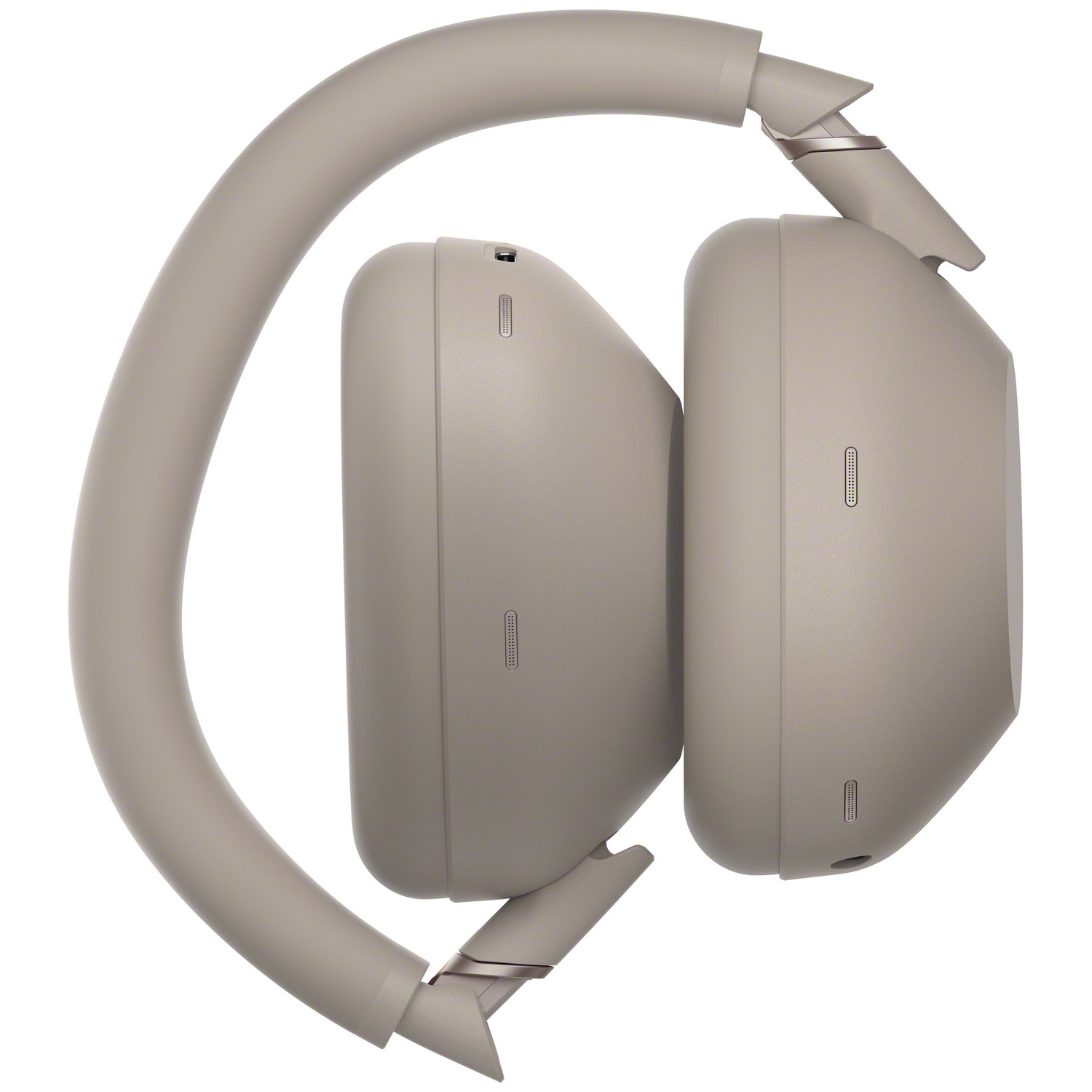 Un casque beige avec des écouteurs pivotants est présenté sur fond blanc.