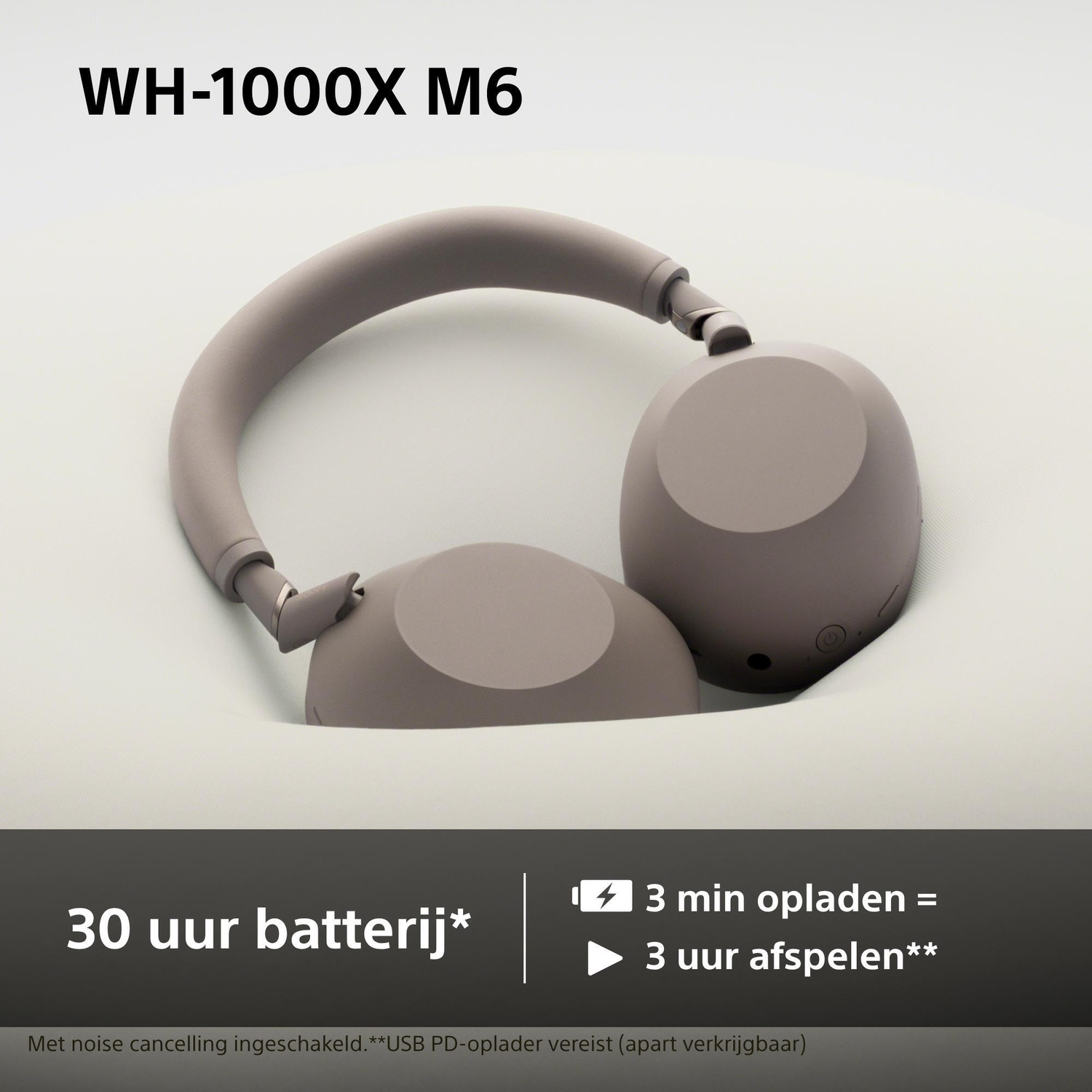Gray WH-1000XM6 headphones on soft surface. 30 hours battery life.