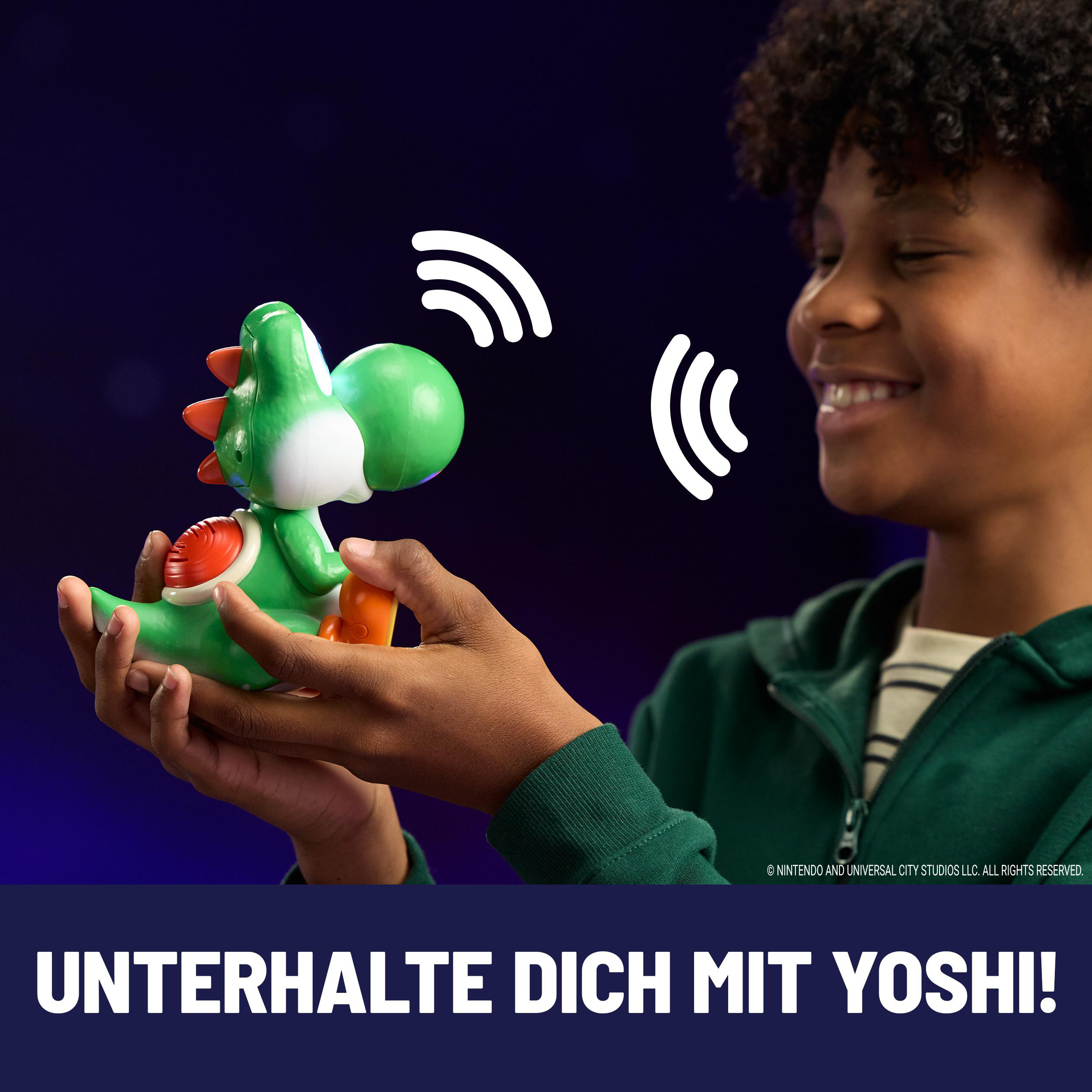 Kind hält eine grüne Yoshi-Figur, weiße Wellen deuten Interaktion an.