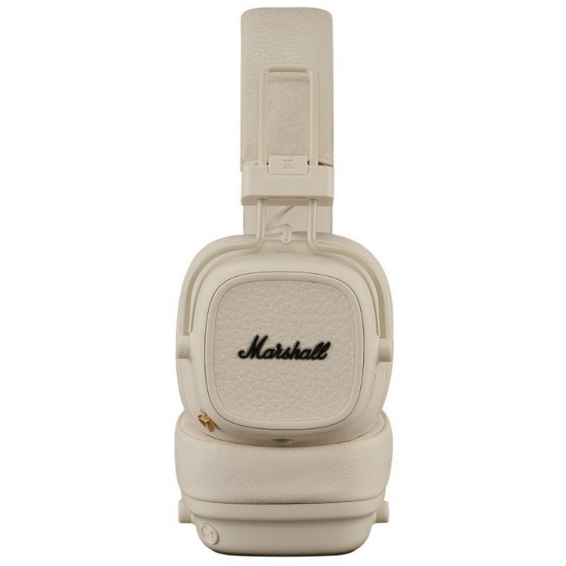 Auriculares beige crema con el logo de Marshall en las almohadillas.