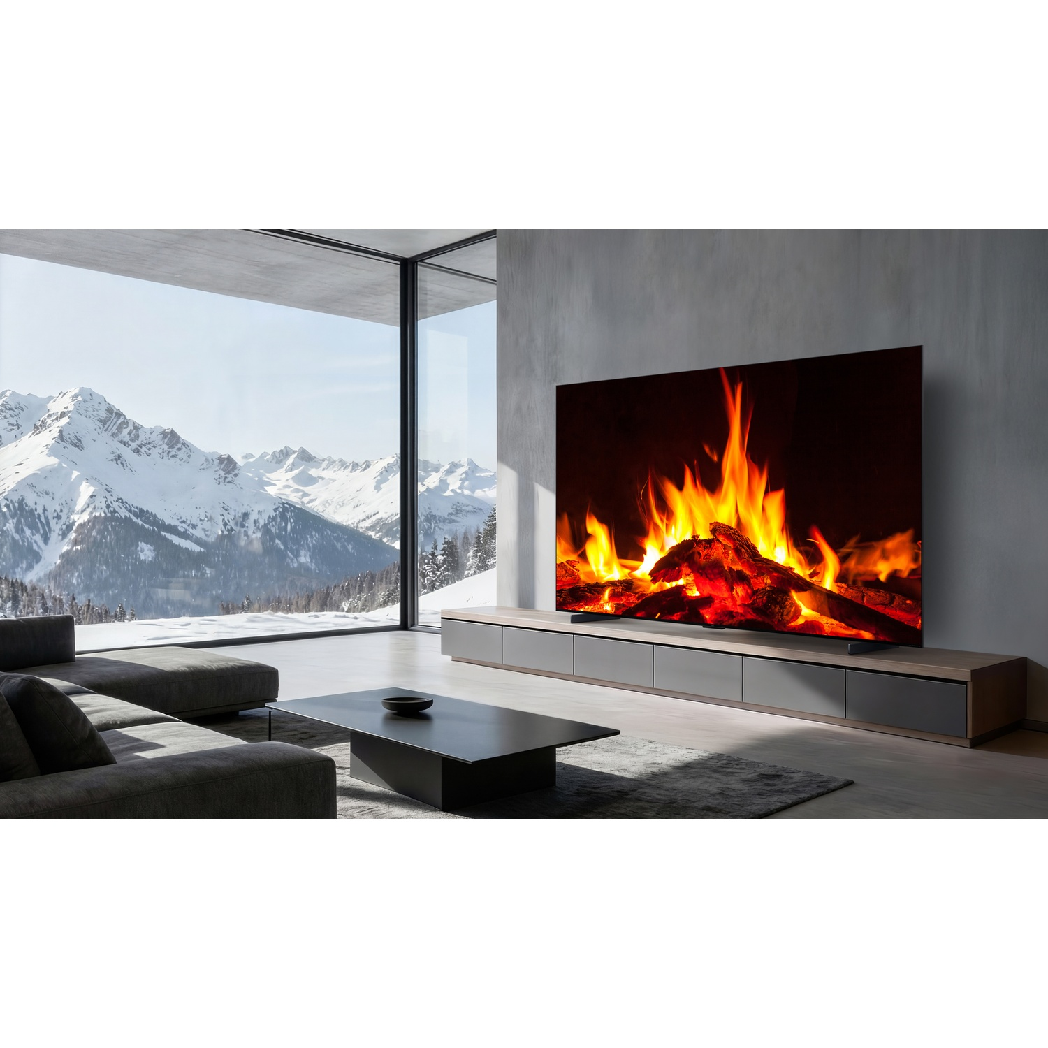 Soggiorno moderno con TV camino, divano grigio e vista montagne innevate.