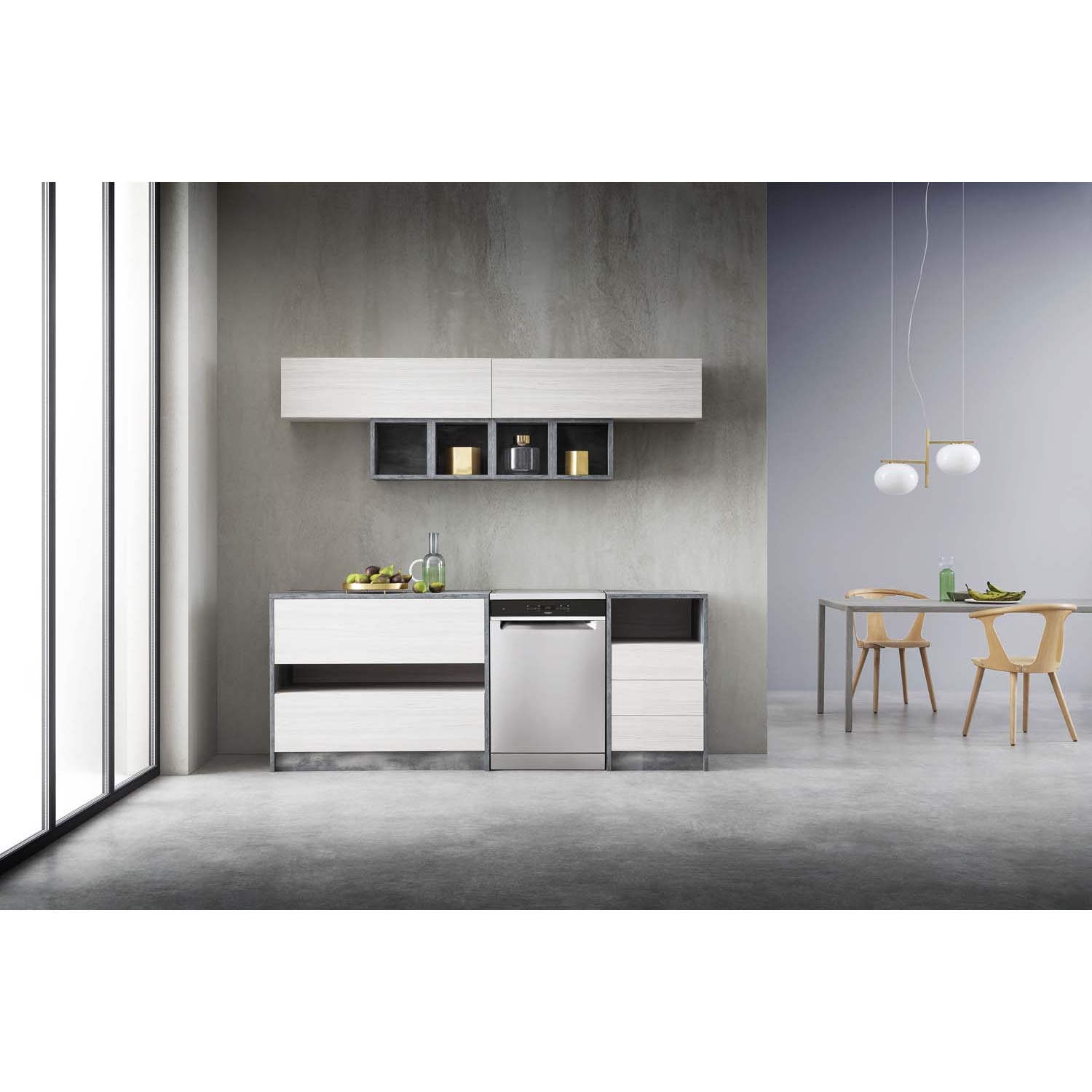 Cucina moderna con lavastoviglie in acciaio, elementi in legno e tavolo da pranzo.