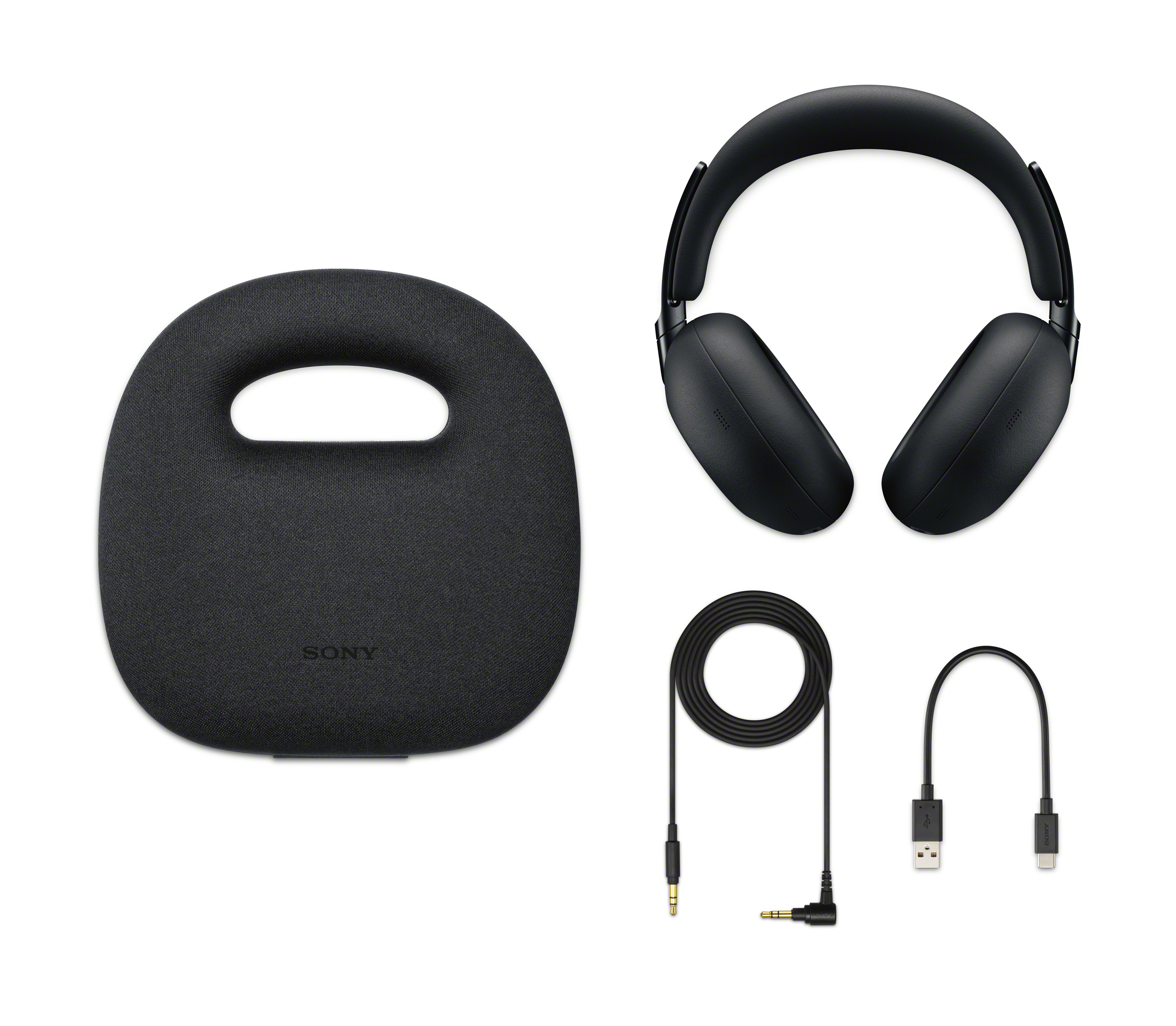 Casque noir avec accessoires : pochette, câble audio, câble USB-C.