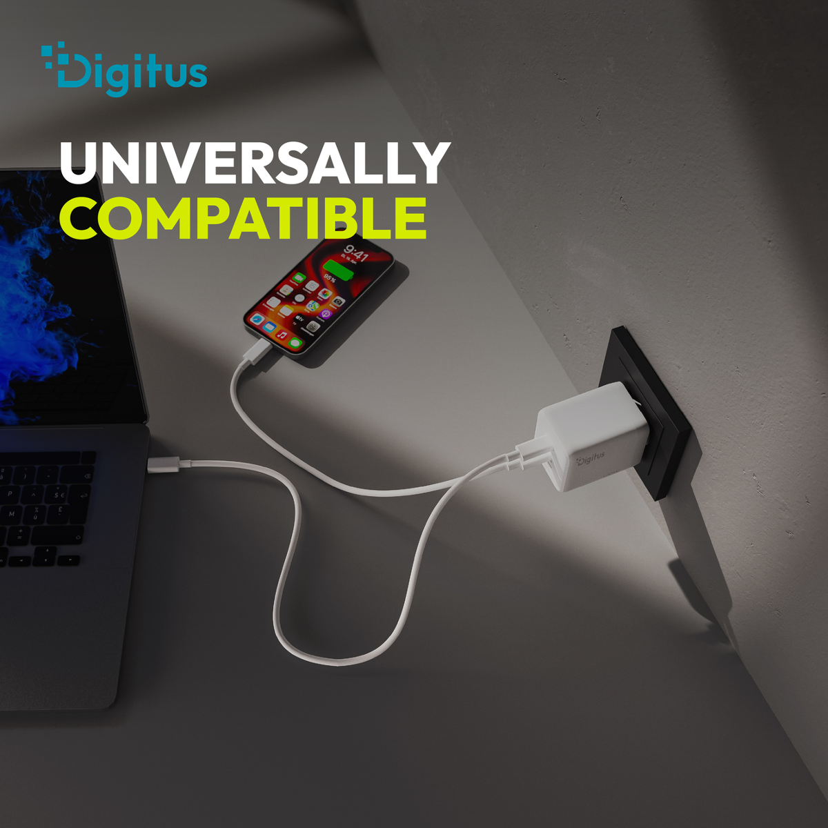 Ein Laptops, ein Smartphone und ein Netzteil sind über weiße Kabel verbunden.