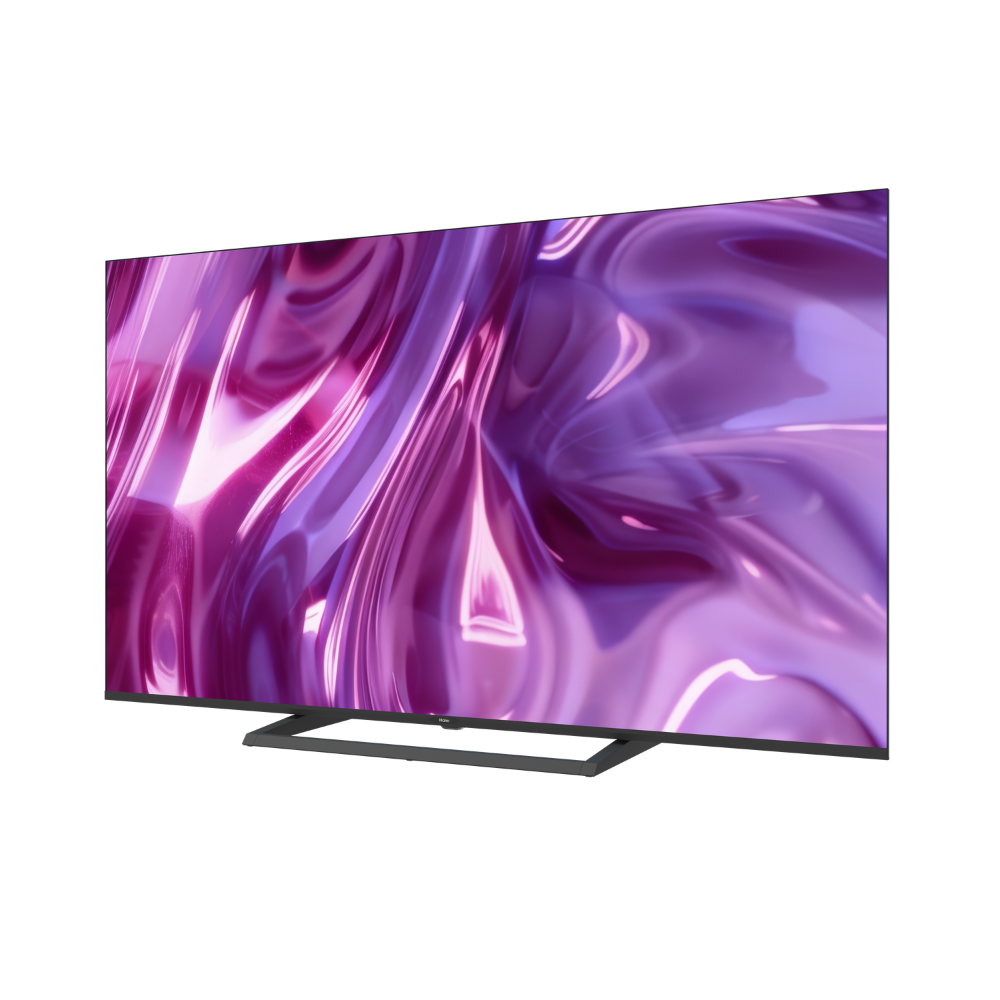 Un televisor moderno de pantalla plana que muestra un patrón abstracto vibrante y morado en su pantalla.