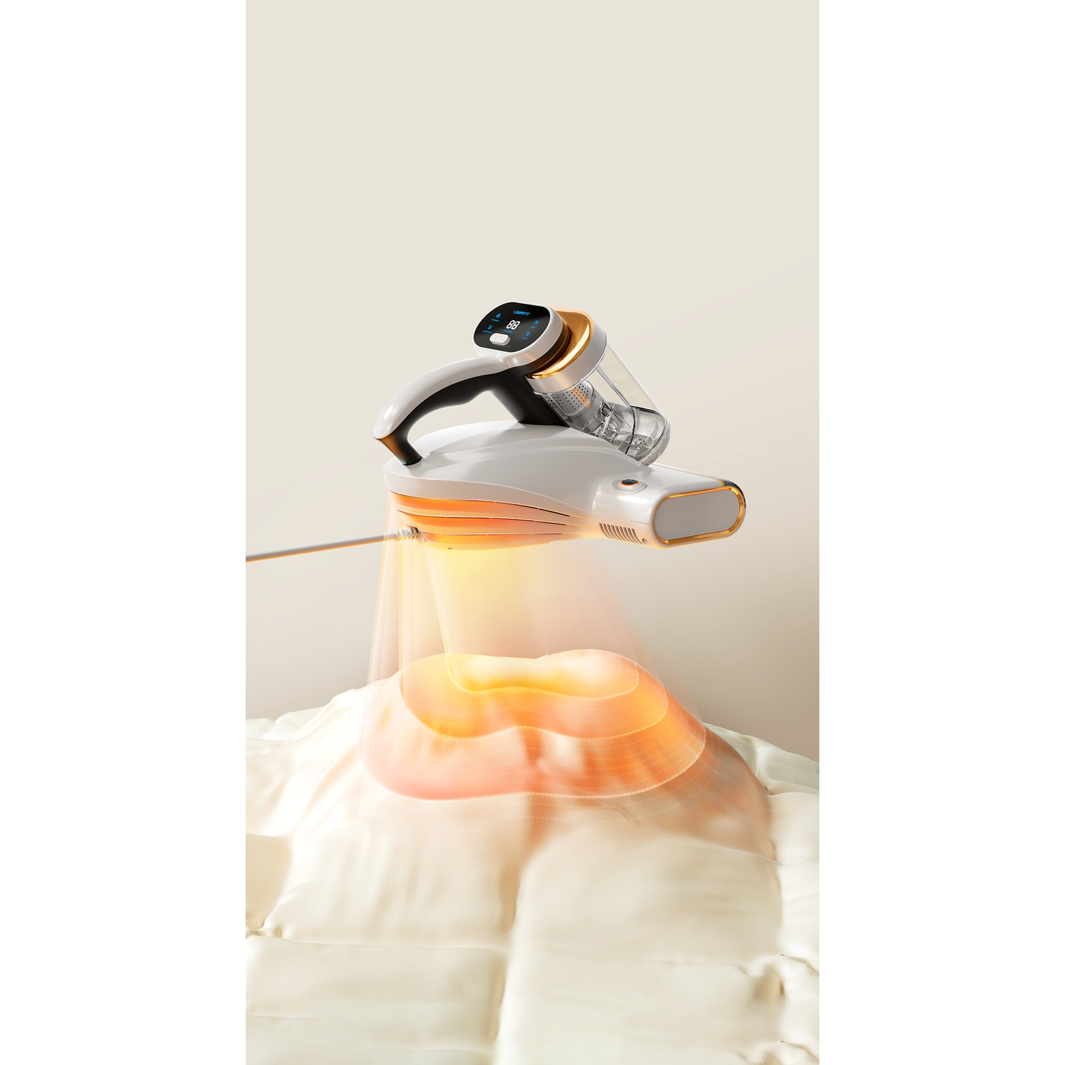 A white and gold device with a screen above a white cushion emitting orange light.