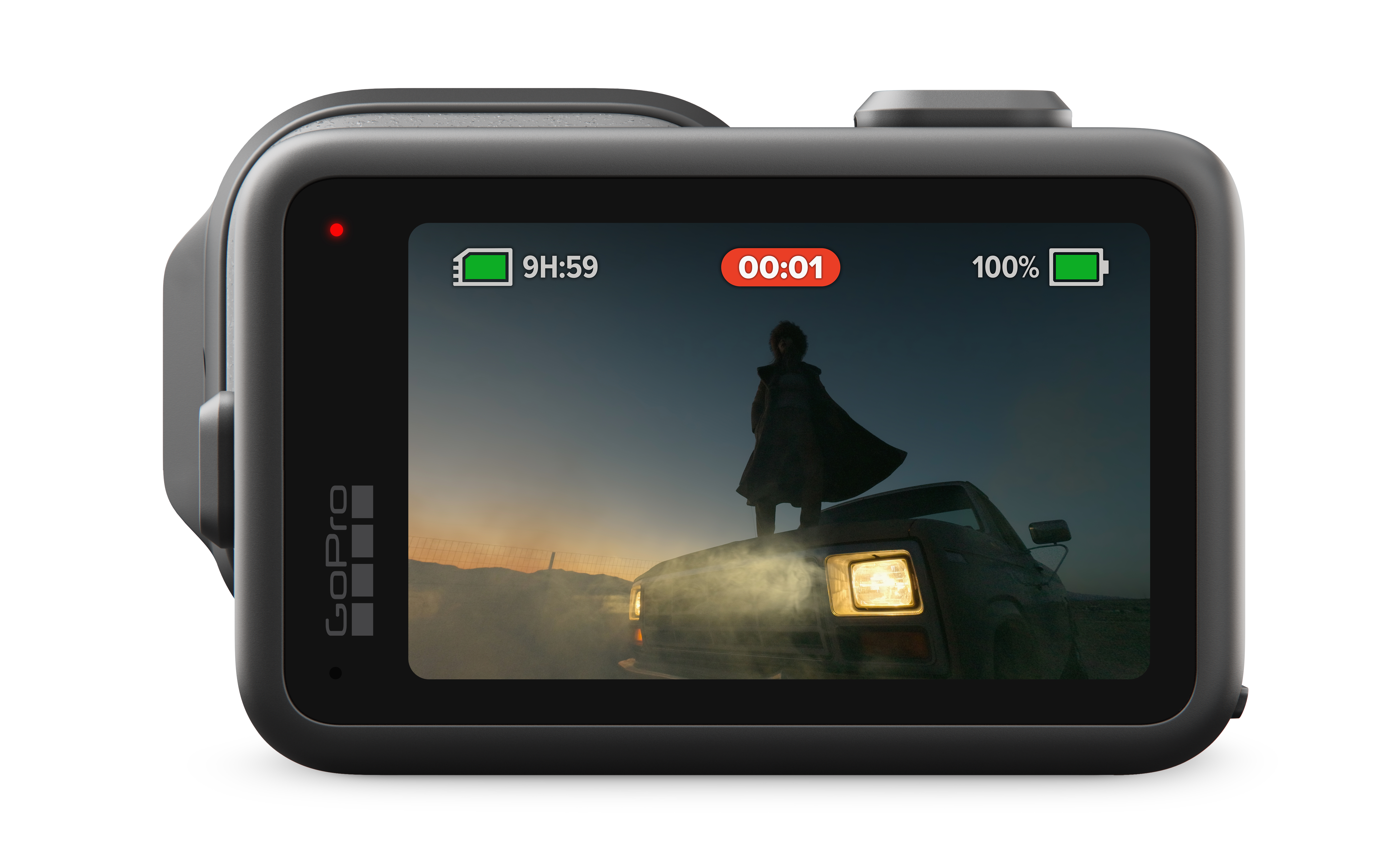 Ekran GoPro: osoba na samochodzie z dymem o zachodzie słońca. 9h:59, 00:01, 100%.