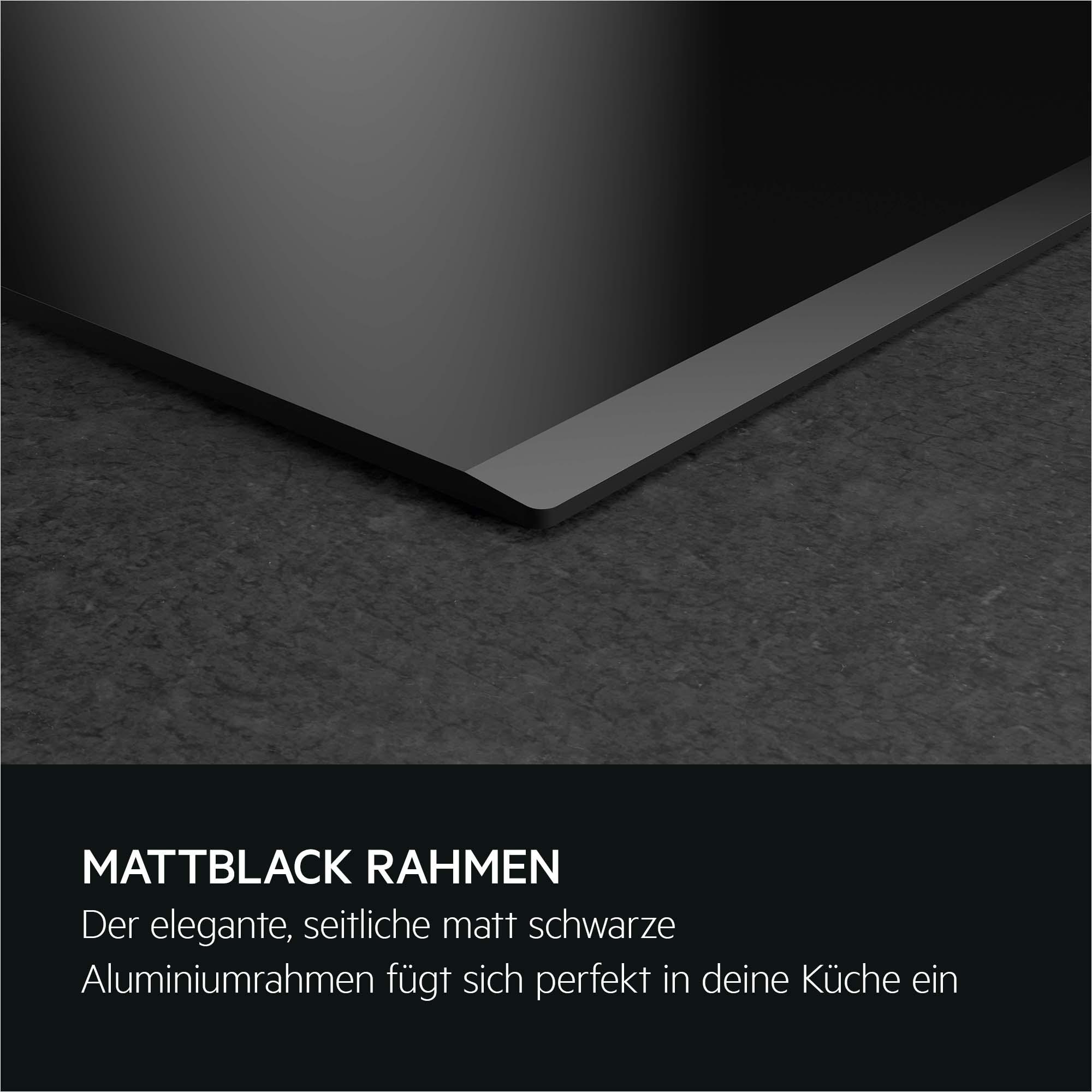 Schwarzer Rahmen mit Steinboden. Text: MATTBLACK RAHMEN.