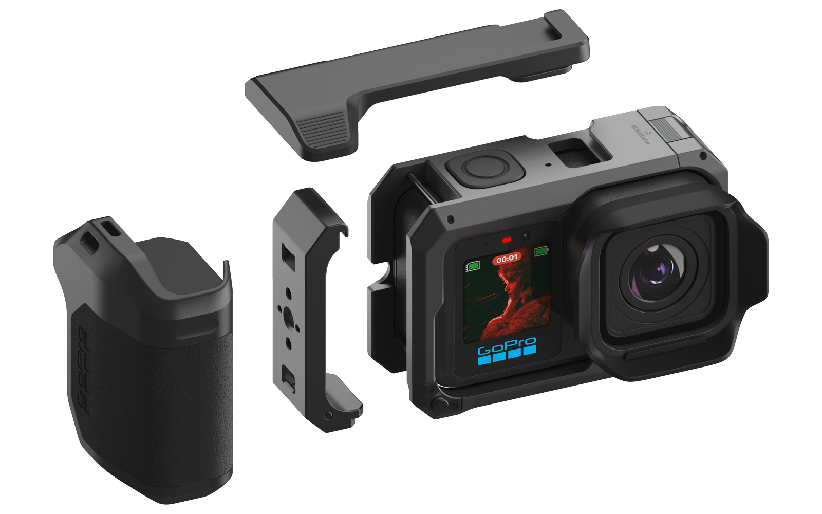 Kamera GoPro z akcesoriami: uchwyt, klatka i osłona obiektywu.