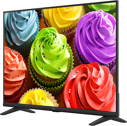 Egy televízió színes, mázas és szórócukros cupcake-okat mutat.