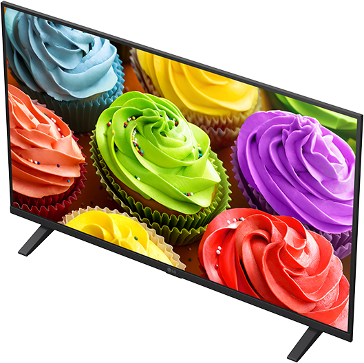 Egy televízió színes, fodros tortabevonatos cupcake-ek közelképét mutatja.