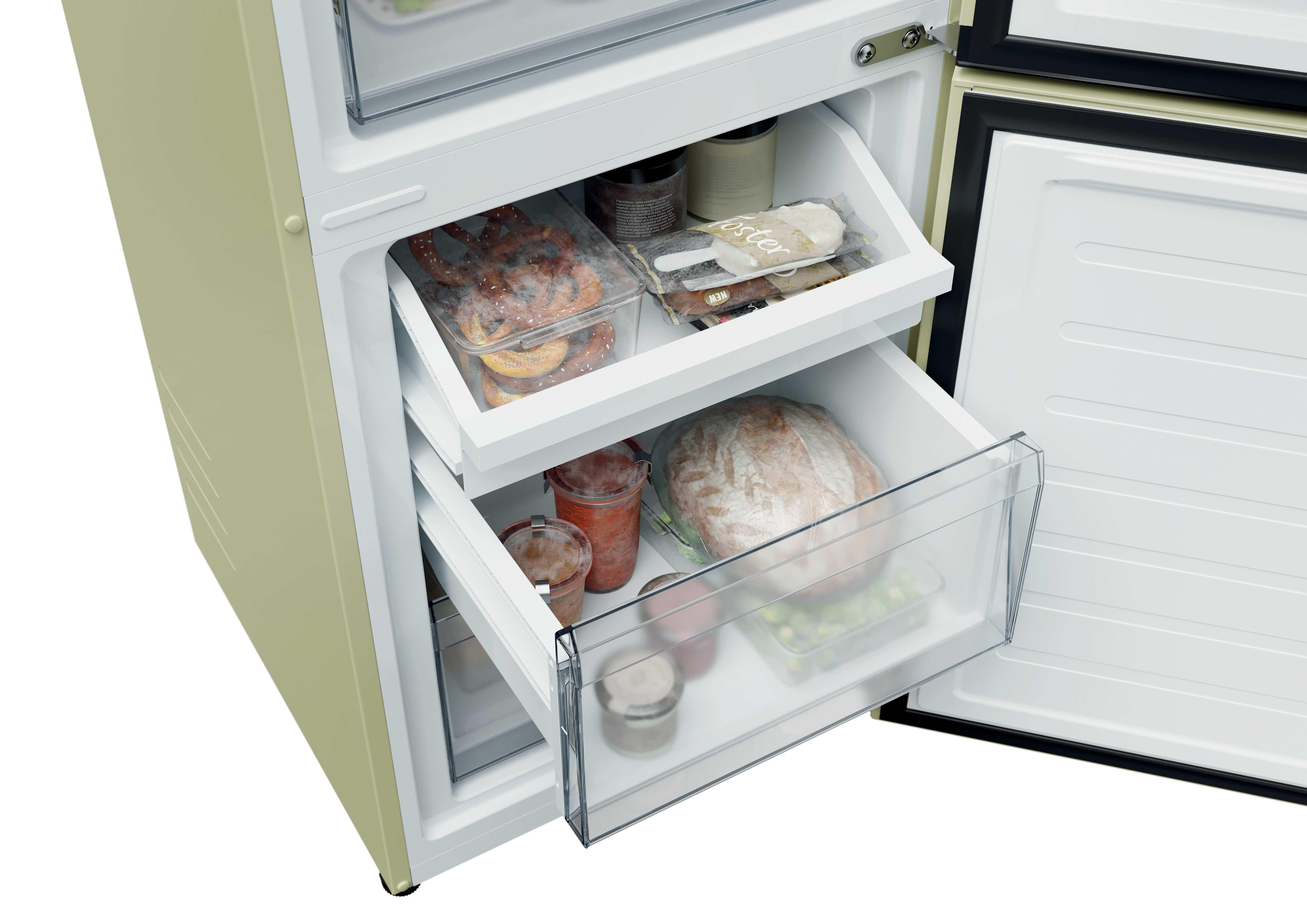 Hellgrüner Kühlschrank mit offenen Schubladen, gefüllt mit Lebensmitteln wie Brezeln, Brot und Eiscreme.