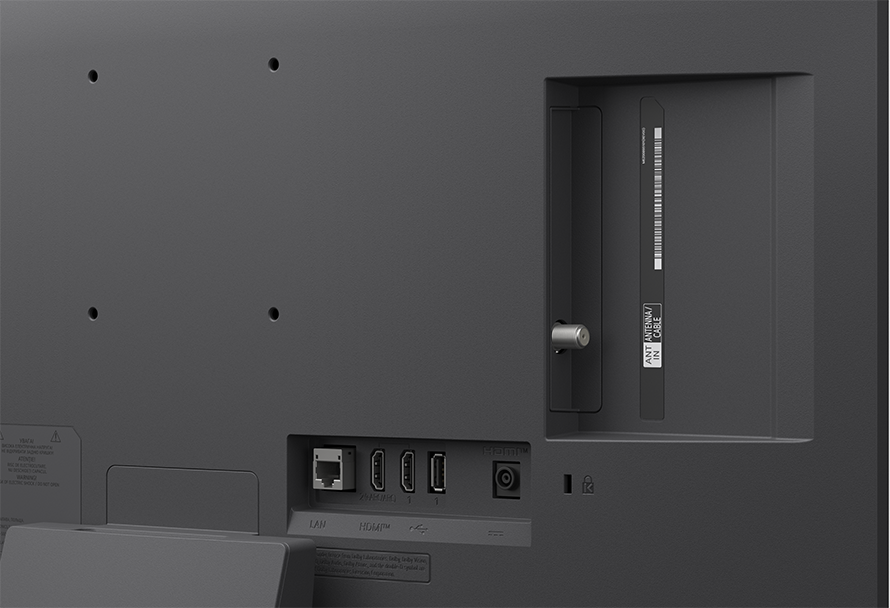 TV hátulja csatlakozókkal: LAN, HDMI, USB és Antenna/kábel bemenet.