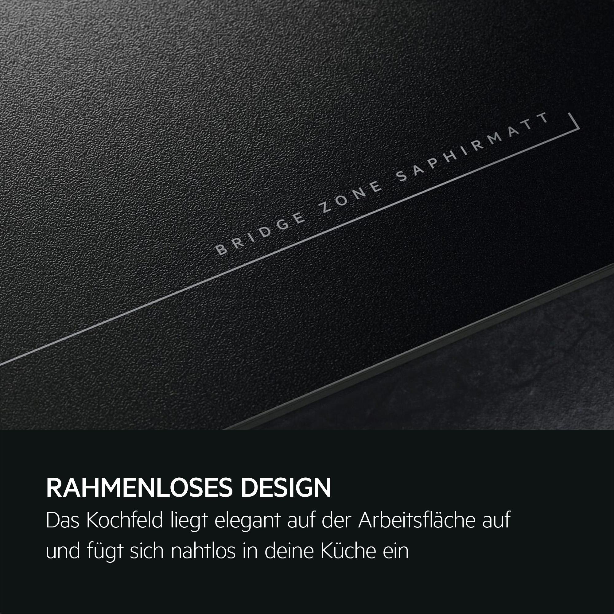 Schwarzes Kochfeld mit "BRIDGE ZONE SAPHIRMATT" Aufschrift.