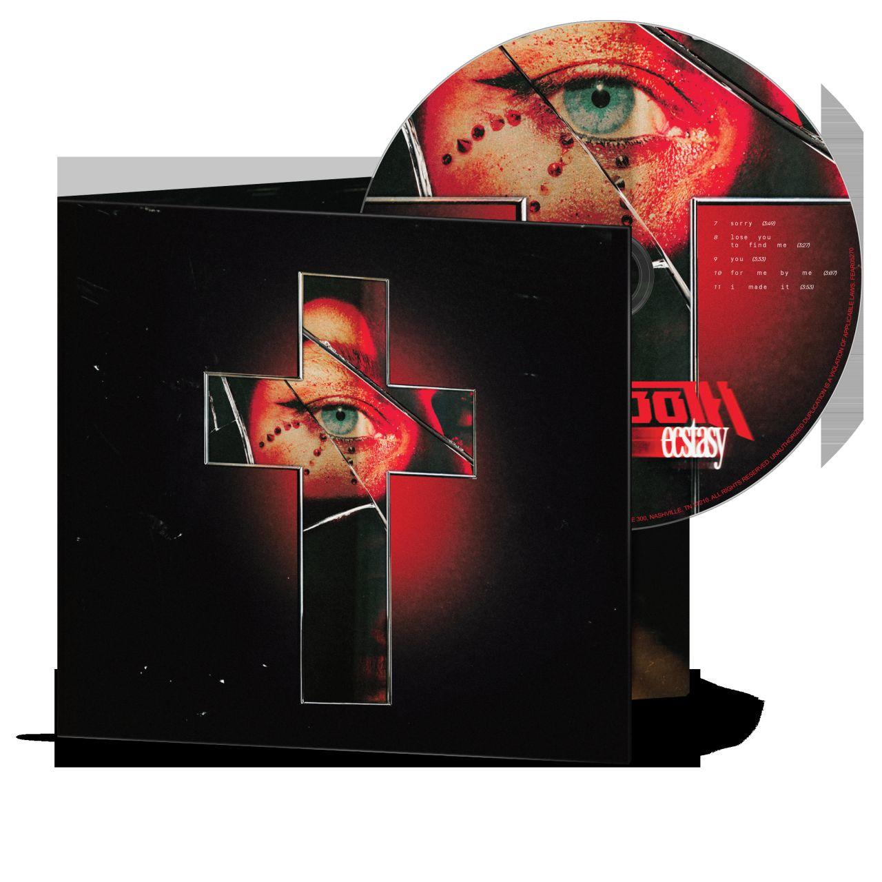 CD-Hülle mit einem roten Kreuz und einem Auge, CD mit Trackliste und Albumtitel.