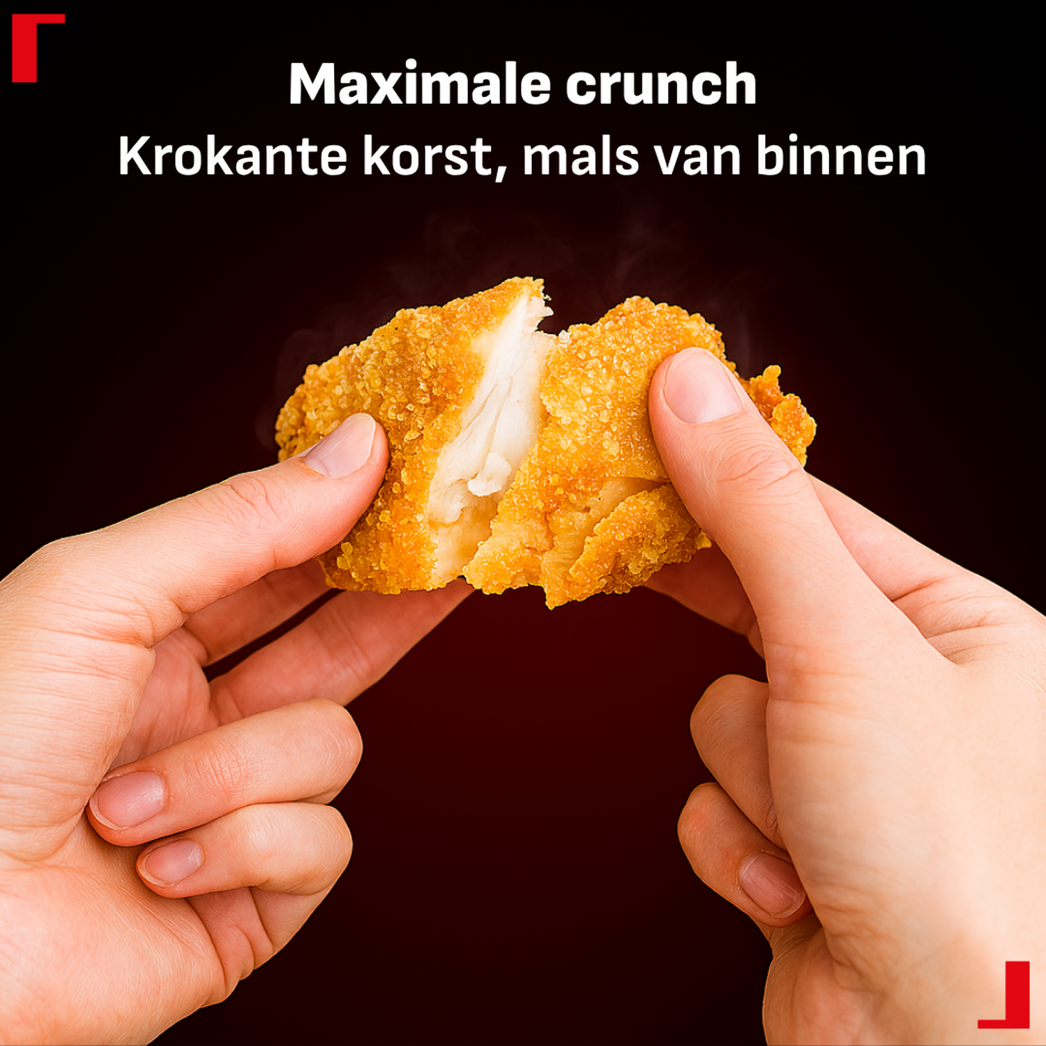 Hands break apart a crispy, golden fried chicken piece against a dark background.
