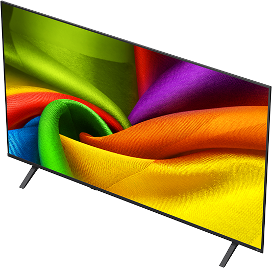 Egy modern, vékony keretes televízió színes anyag élénk örvényét mutatja: zöld, sárga, narancs, piros, lila.