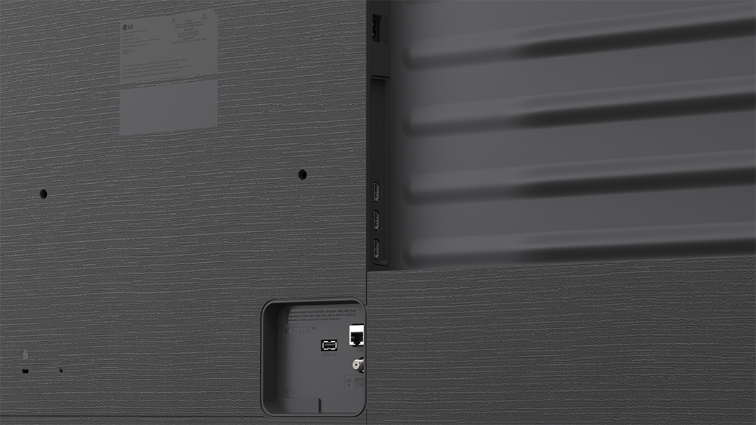 Egy TV hátoldala HDMI, USB és LAN portokkal.