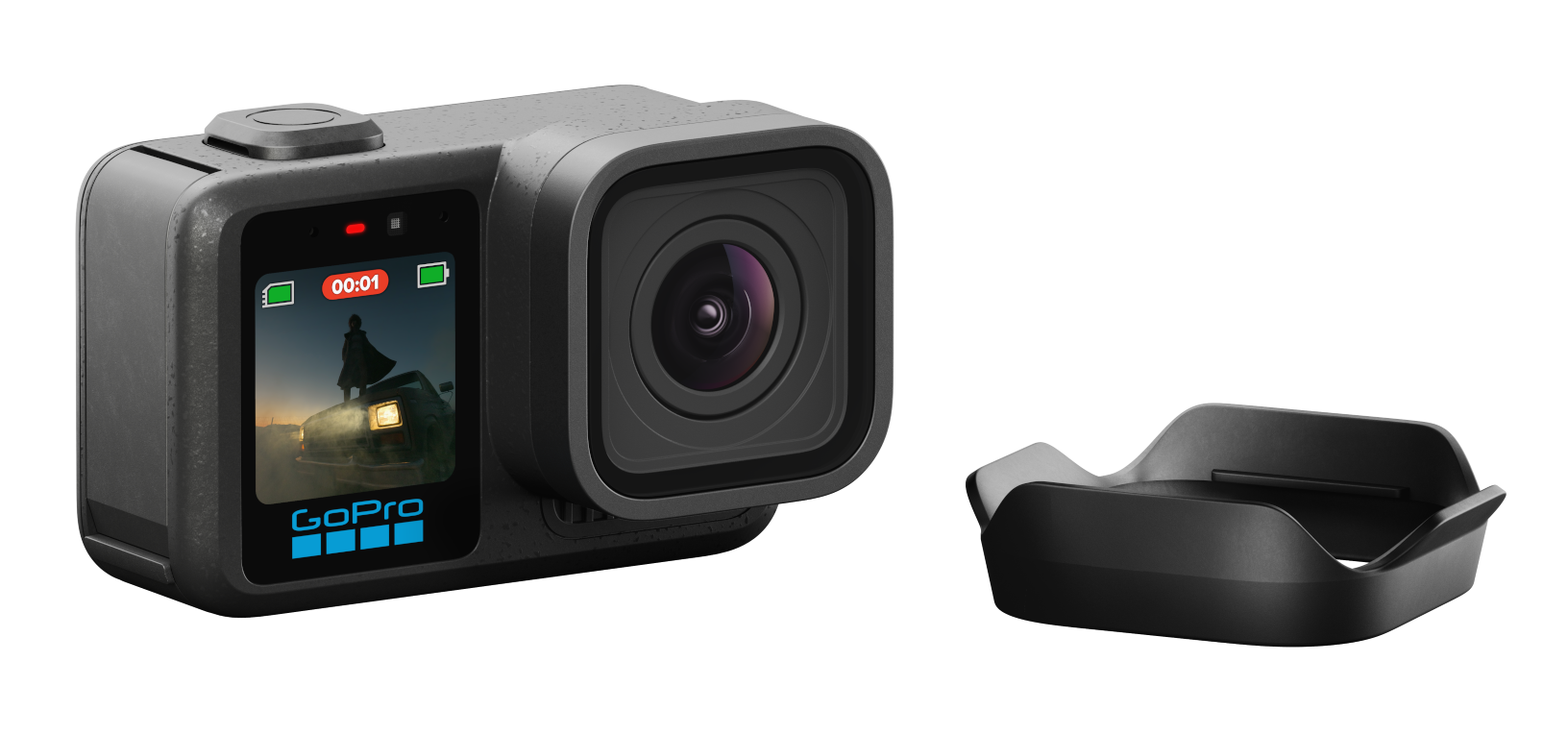 Szara kamera GoPro z akcesorium na czarnym tle.