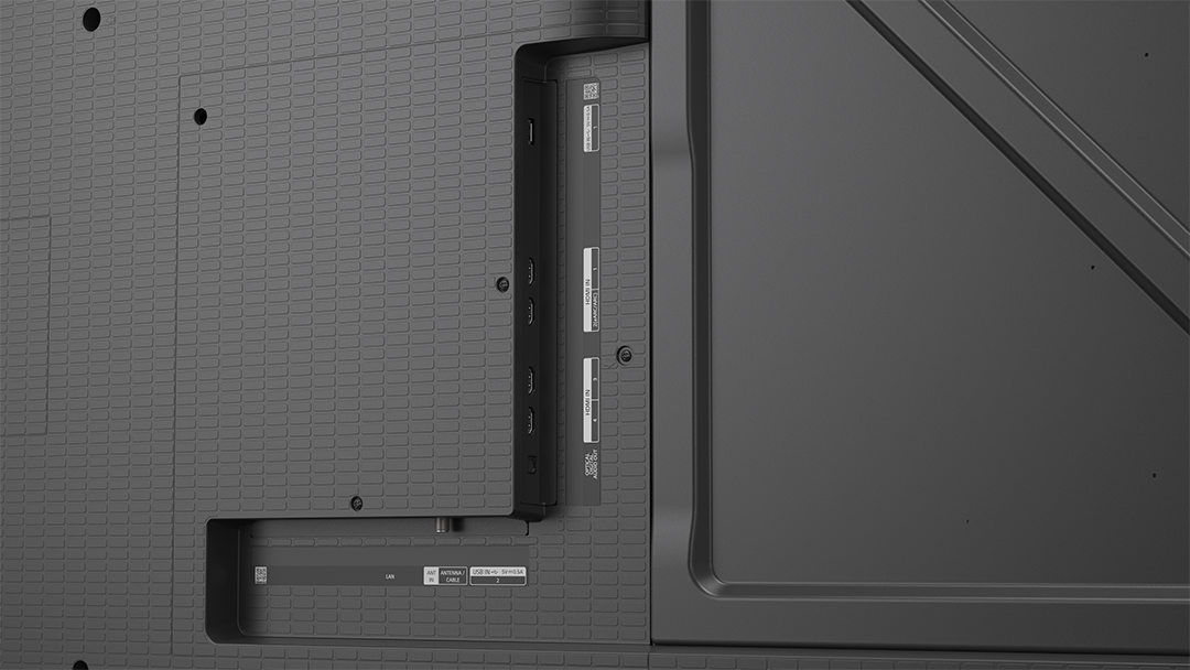 TV hátlapja portokkal: HDMI, USB, LAN, Antenna/Kábel bemenet.