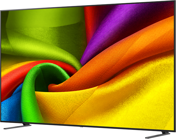 Egy modern TV élénk, színes anyagokból álló absztrakt mintát jelenít meg.