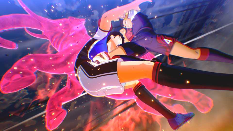 Zwei Anime-Fußballer kämpfen um den Ball, umgeben von einer rosa Energieform.