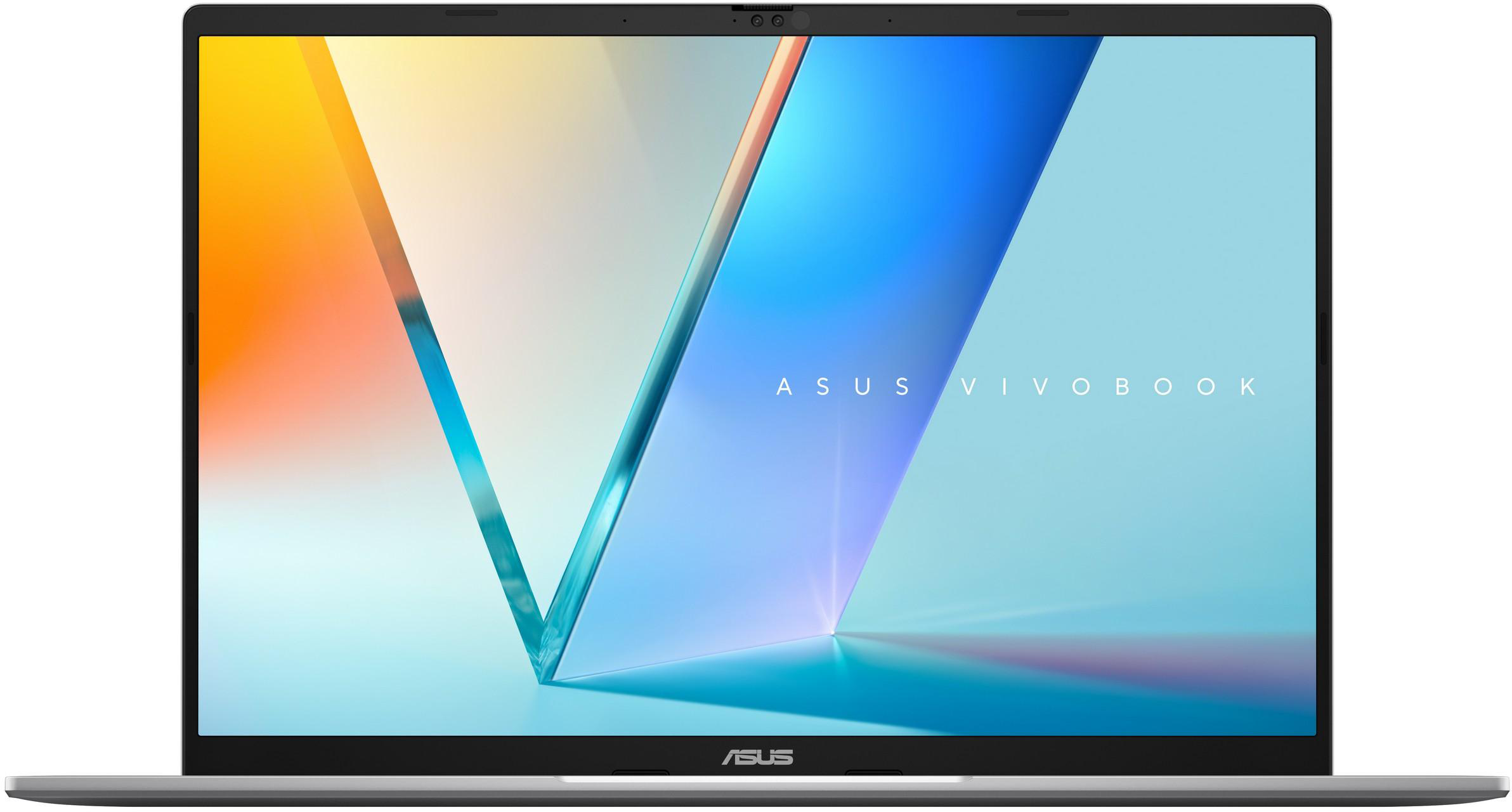 Egy nyitott ezüst laptop színes háttérképpel a képernyőjén.