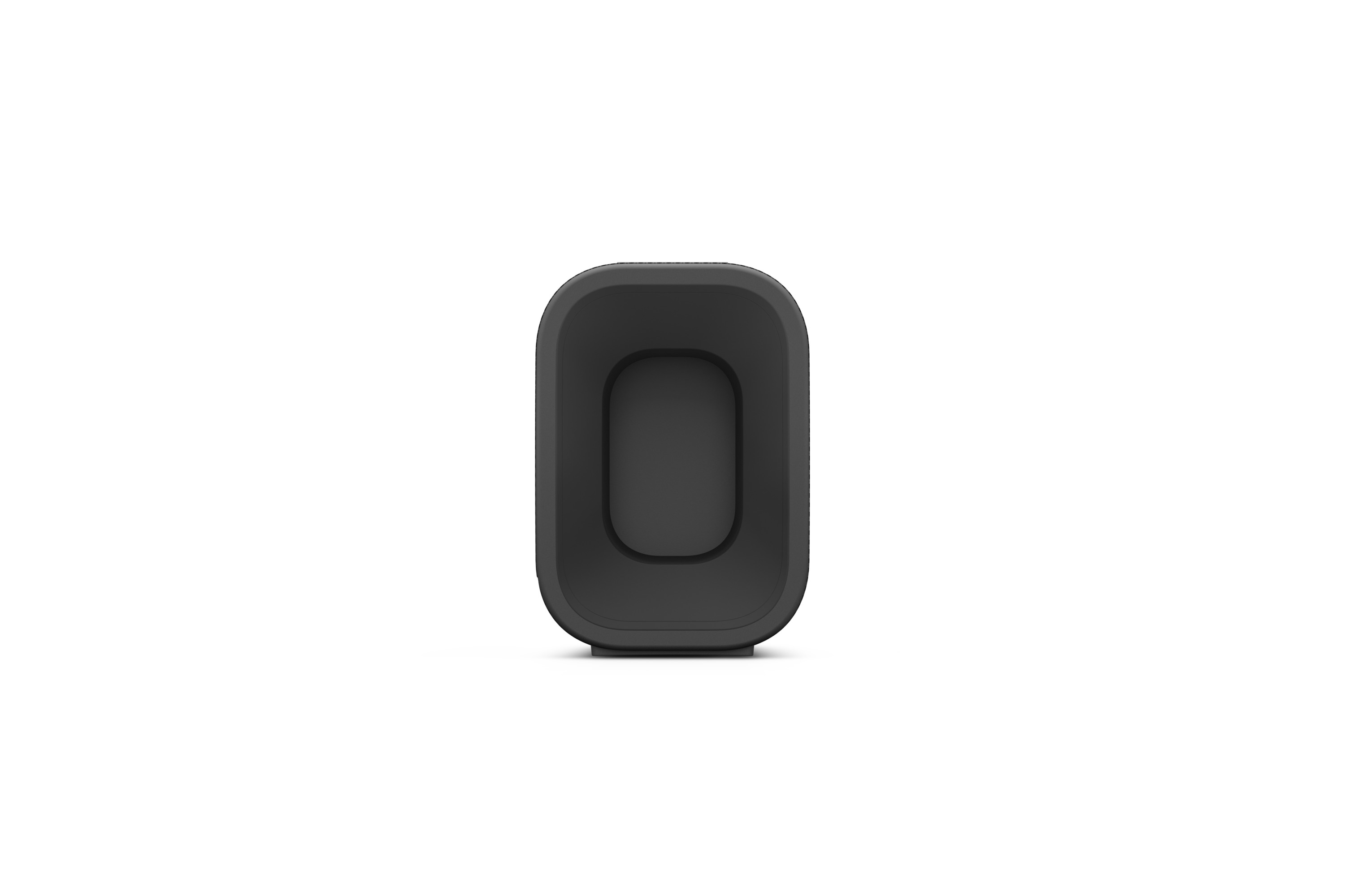 Un objet noir rectangulaire aux coins arrondis se tient sur une surface blanche.