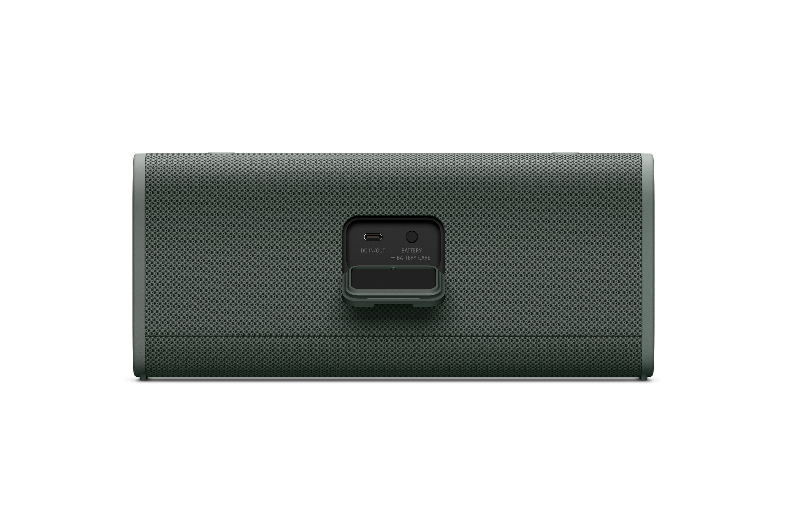 Altoparlante verde con sportello aperto che rivela le porte DC IN/OUT e Batteria.
