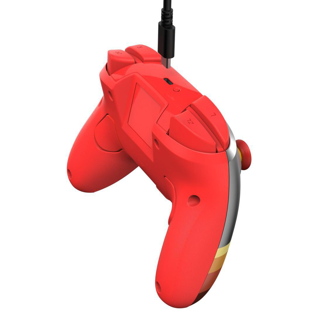 Ein roter Controller mit silbernen und gelben Akzenten, mit Kabel.
