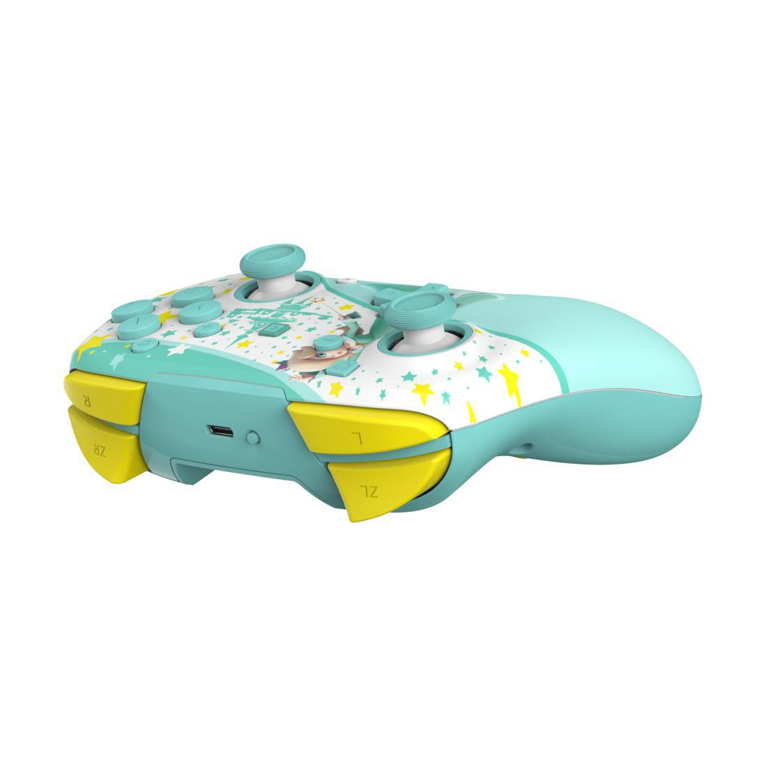 Ein türkisfarbener Controller mit gelben Akzenten und Sternenmuster.