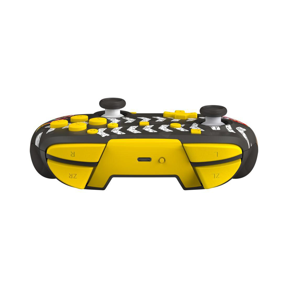 Ein gelb-schwarzer Controller mit gelben Knöpfen und Joysticks.