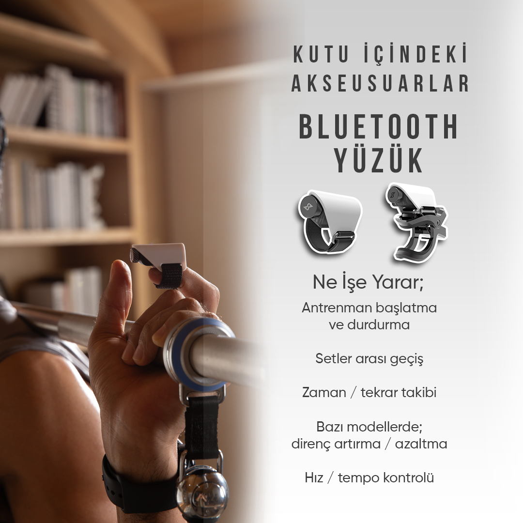 Bir adam halter tutuyor, parmağında bir cihazın yakın çekimi. Metin: Bluetooth yüzük.